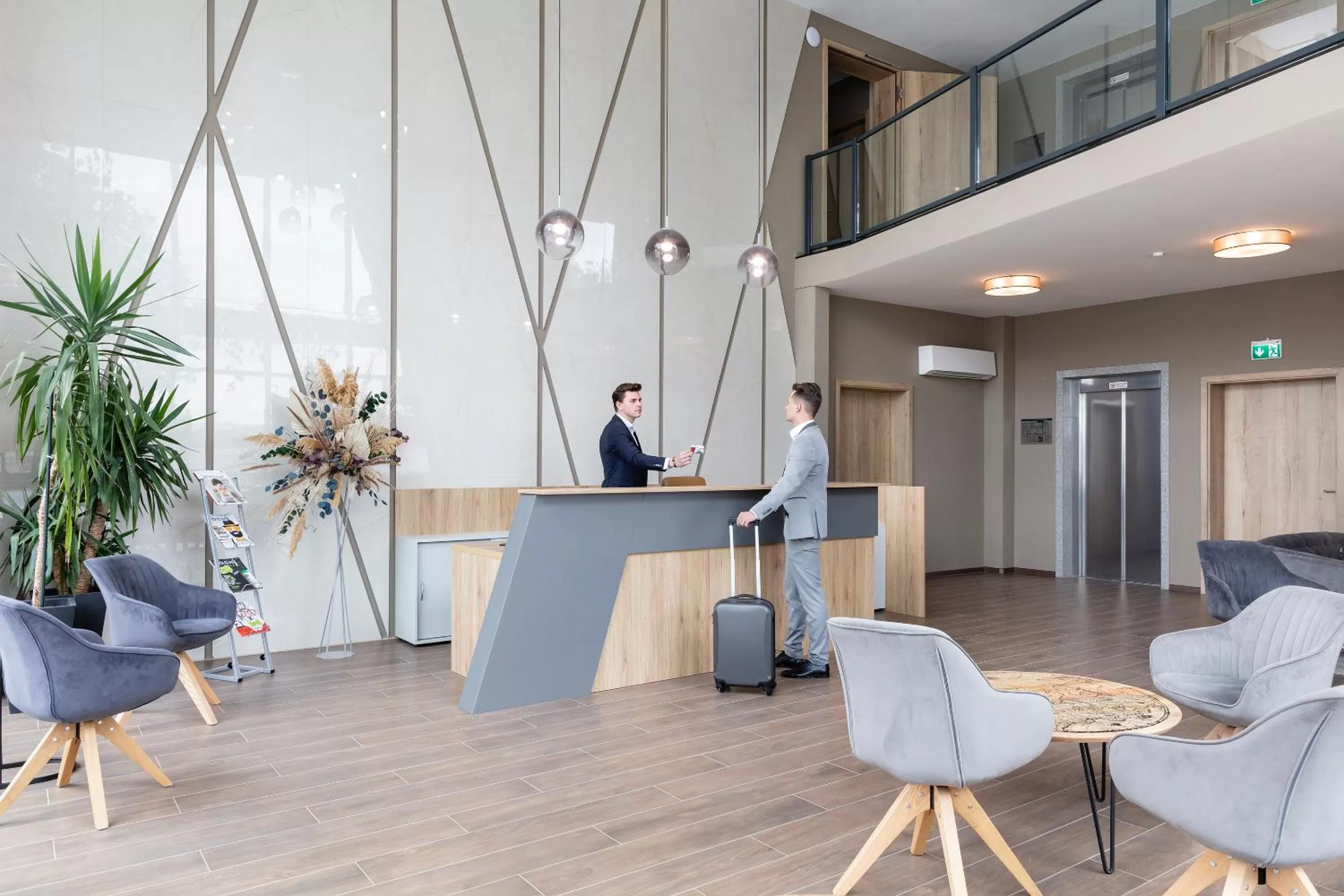 Lobby or reception in Dominik Hotel & Eventsaal