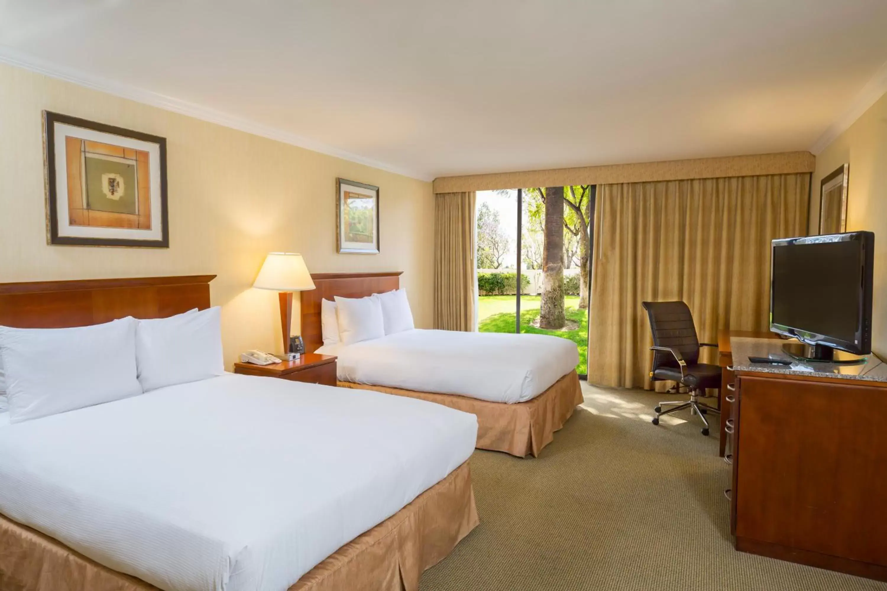 Photo of the whole room, Bed in Ontario Airport Hotel & Conference Center