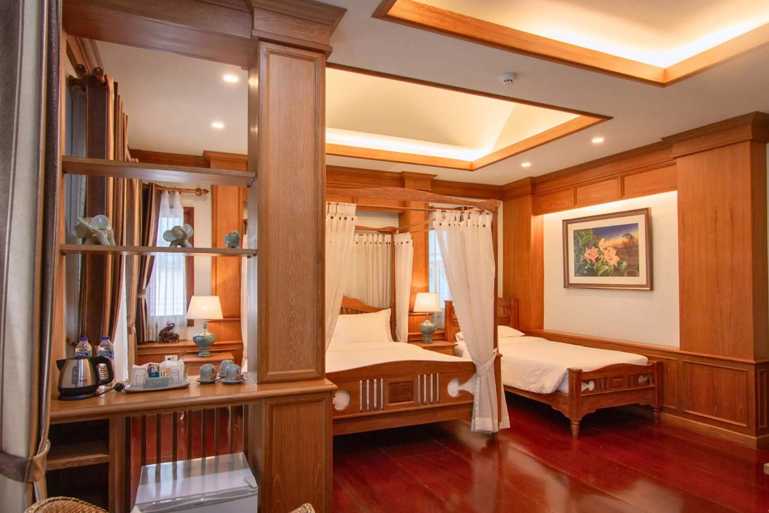 Bed in Rich Garden House Hotel