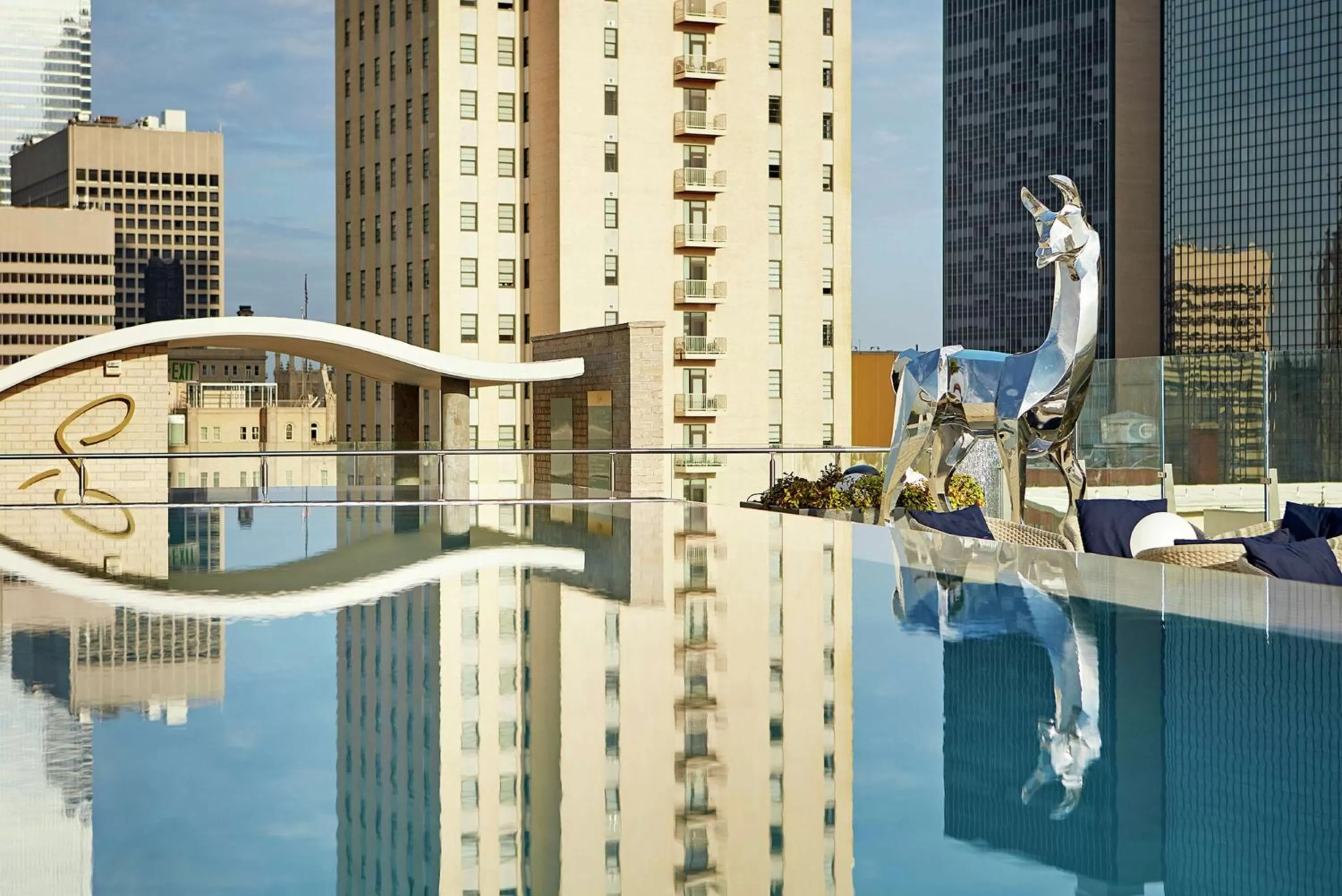 Pool view in The Statler Dallas, Curio Collection By Hilton