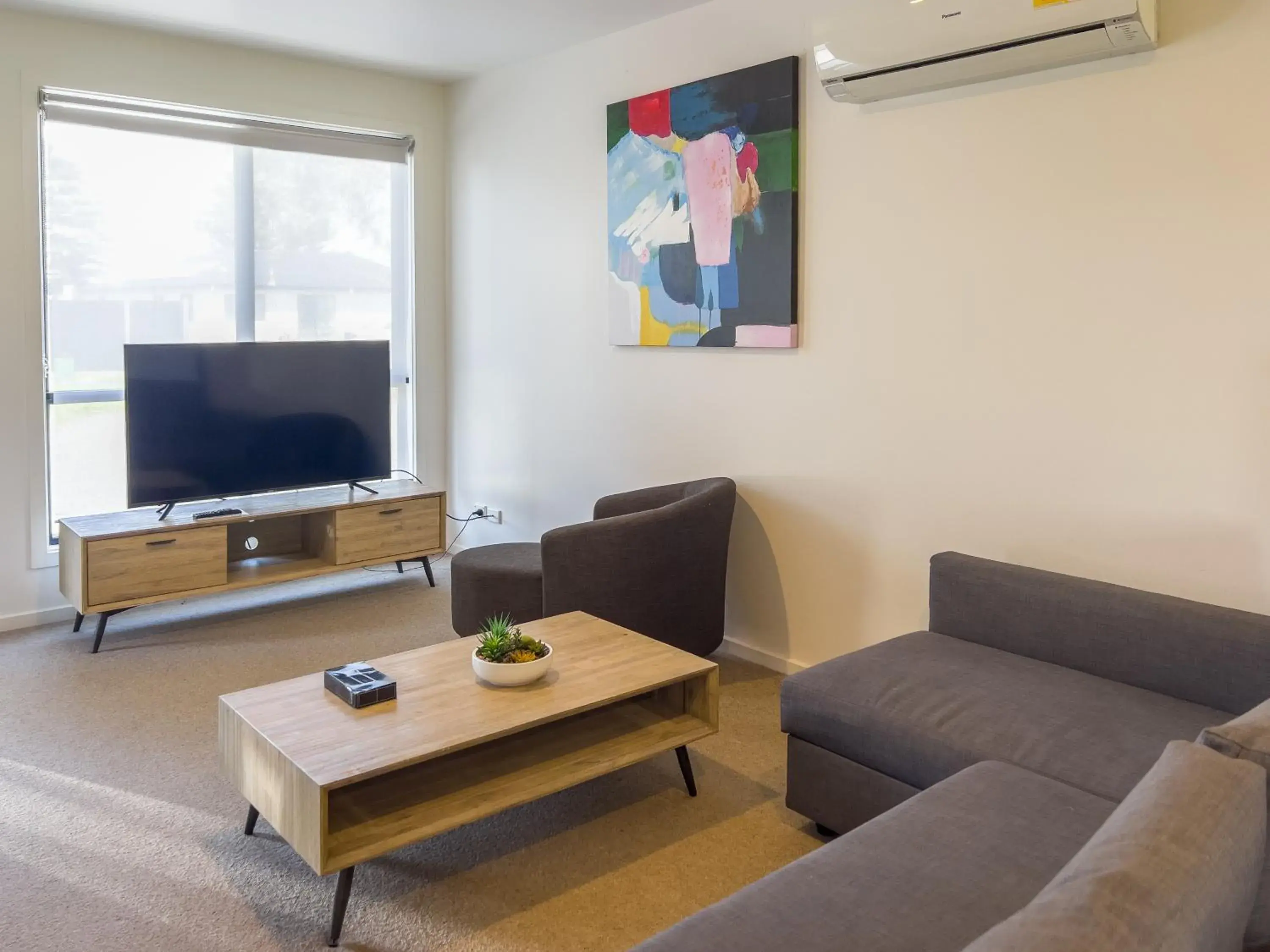 TV and multimedia, Seating Area in A1 Motels and Apartments Port Fairy
