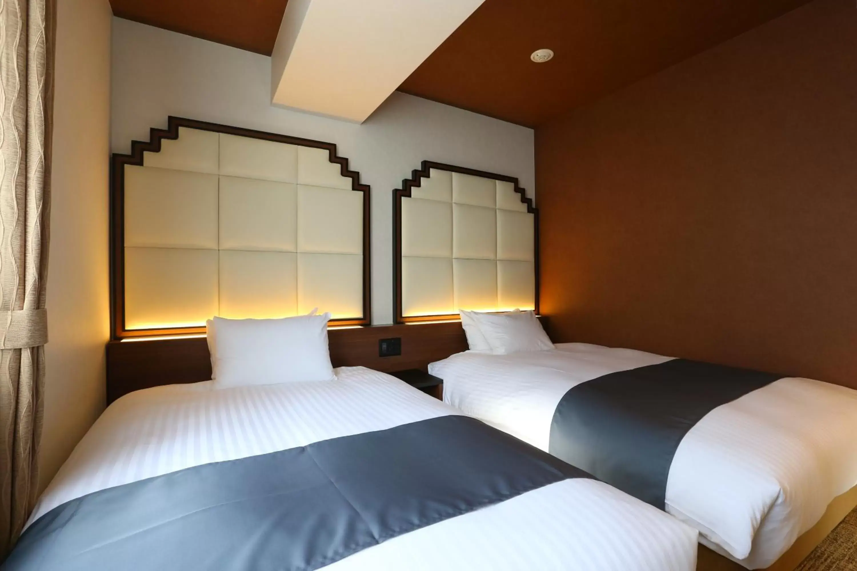 Bed in Hotel Wing International Select Osaka Umeda