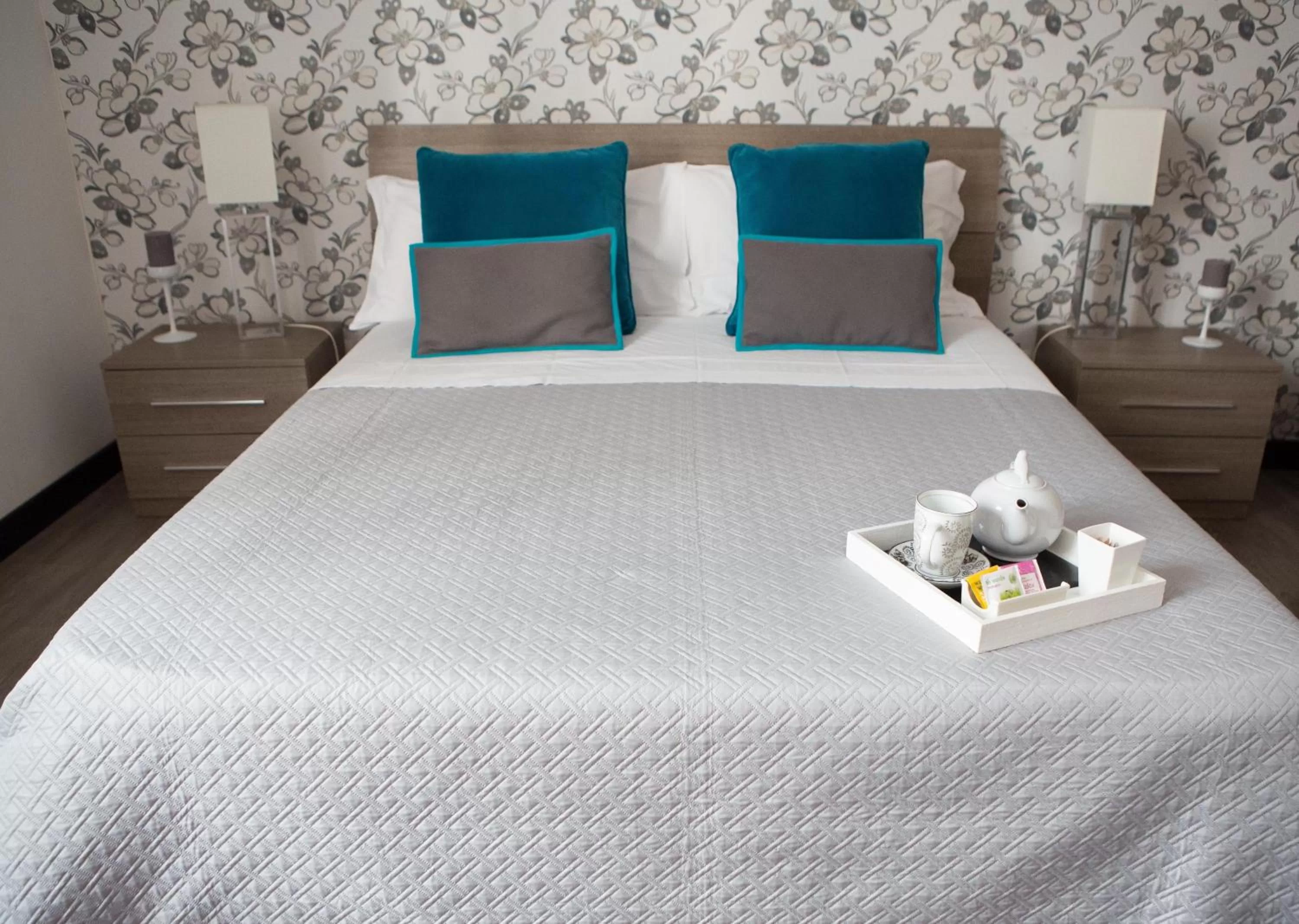 Bed in Nobilcasa Suites