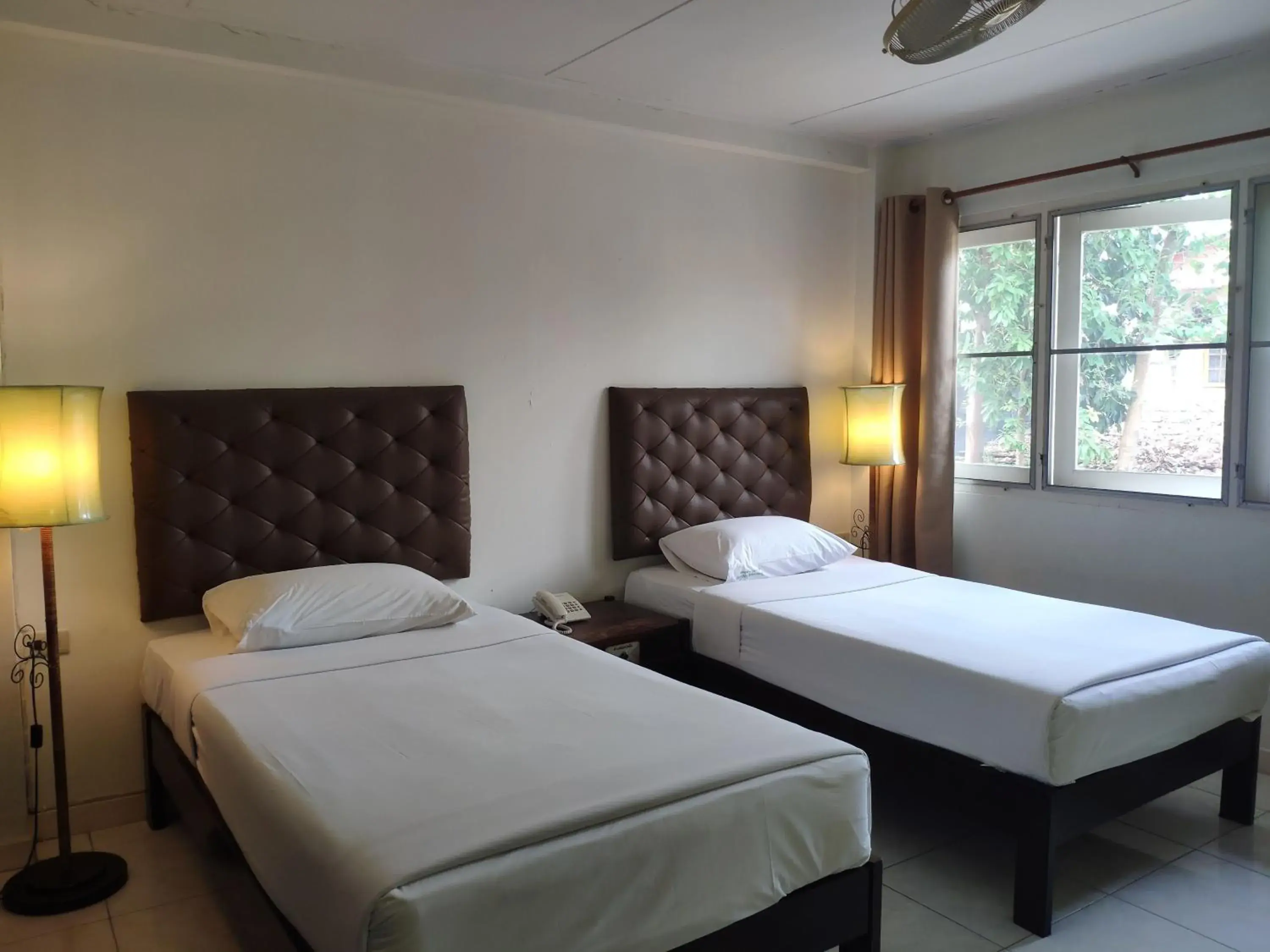 Bed in Changpuak Hotel