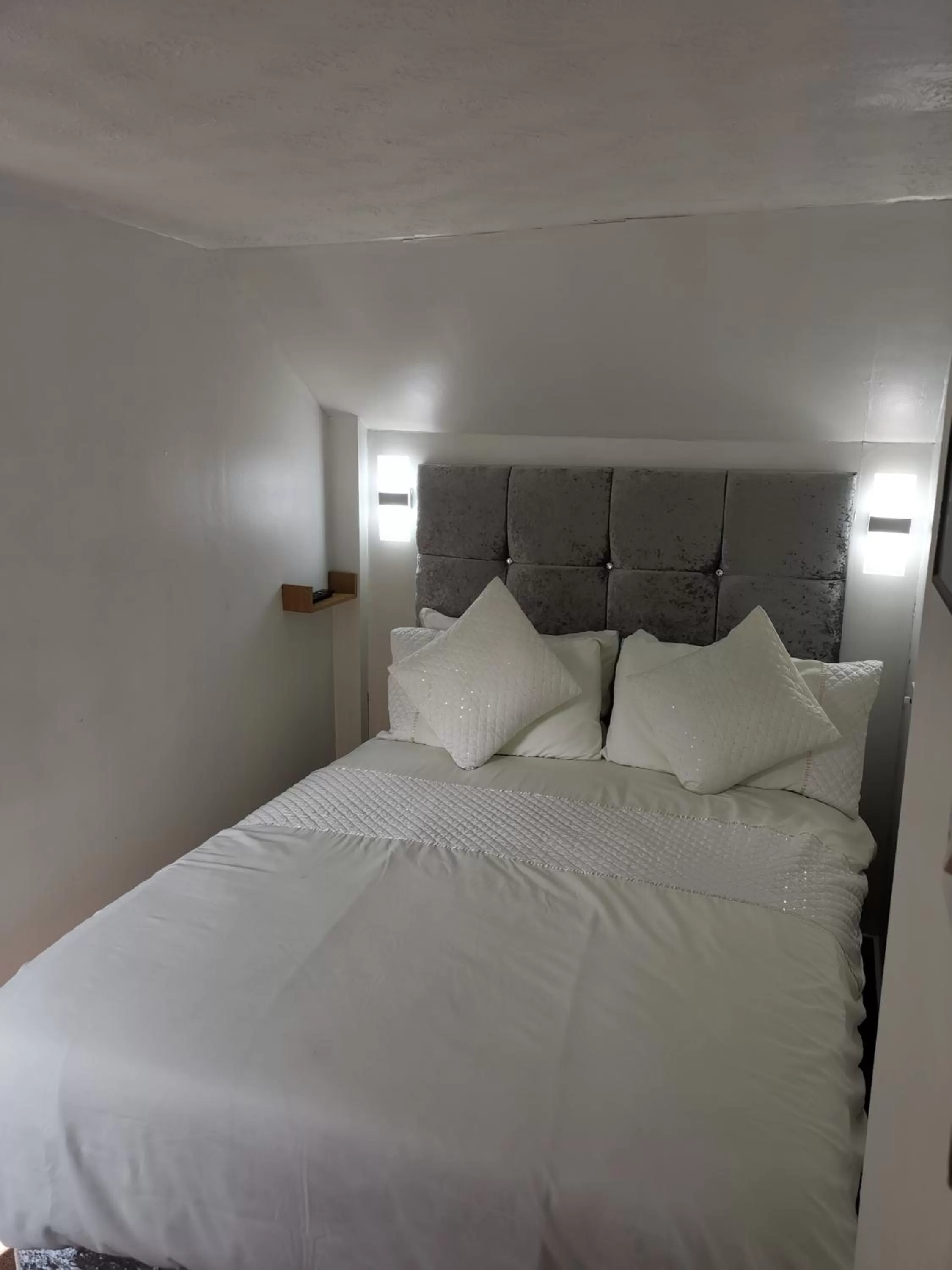 Bedroom, Bed in Glenfern Guest House and a separate Cottage with its own private hot tub