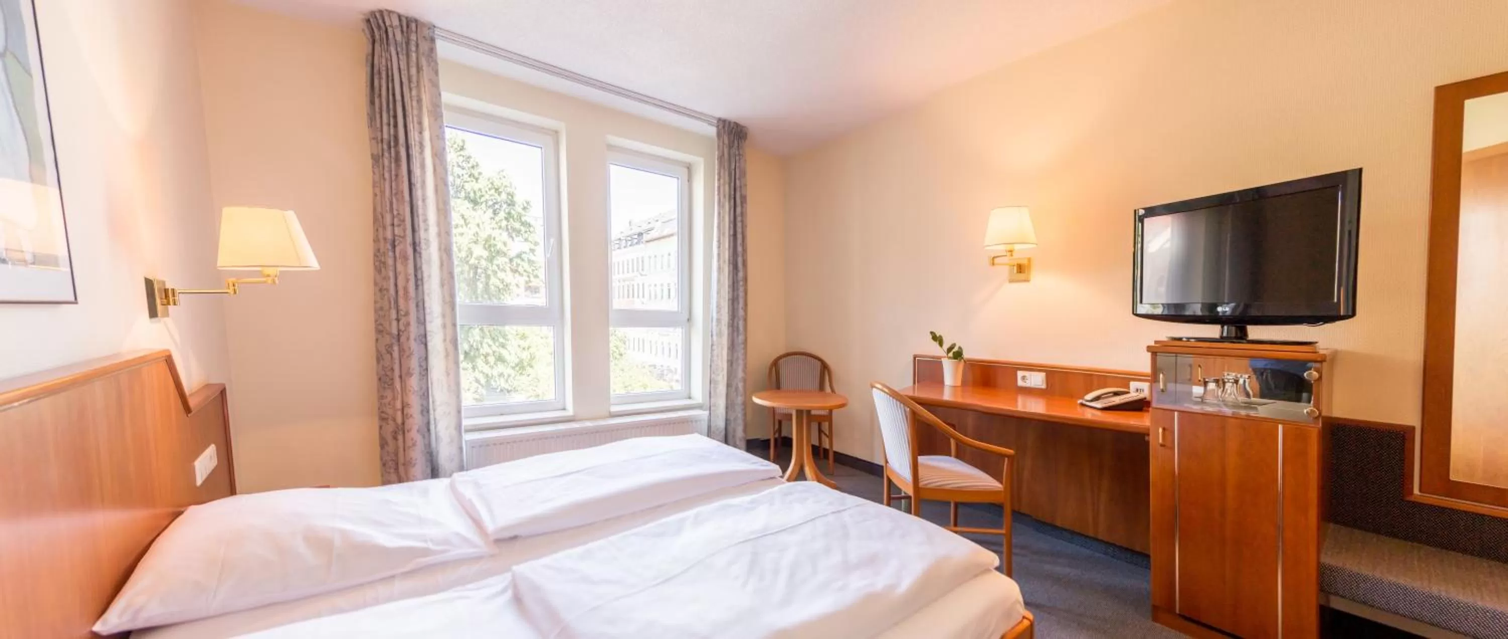 Photo of the whole room, Bed in Hotel Markgraf Leipzig