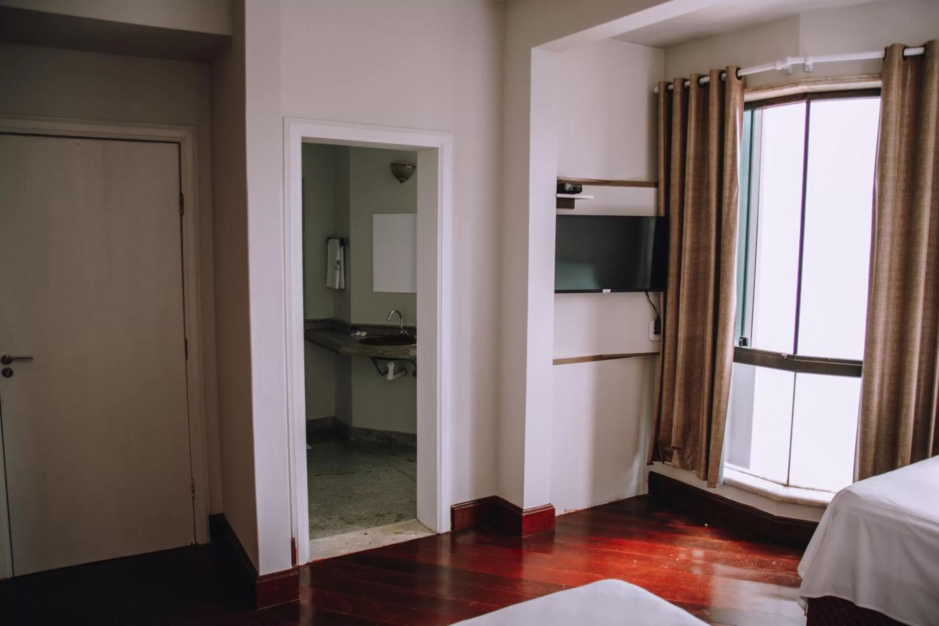 Bed in SAMIR HOTEL COMFORT