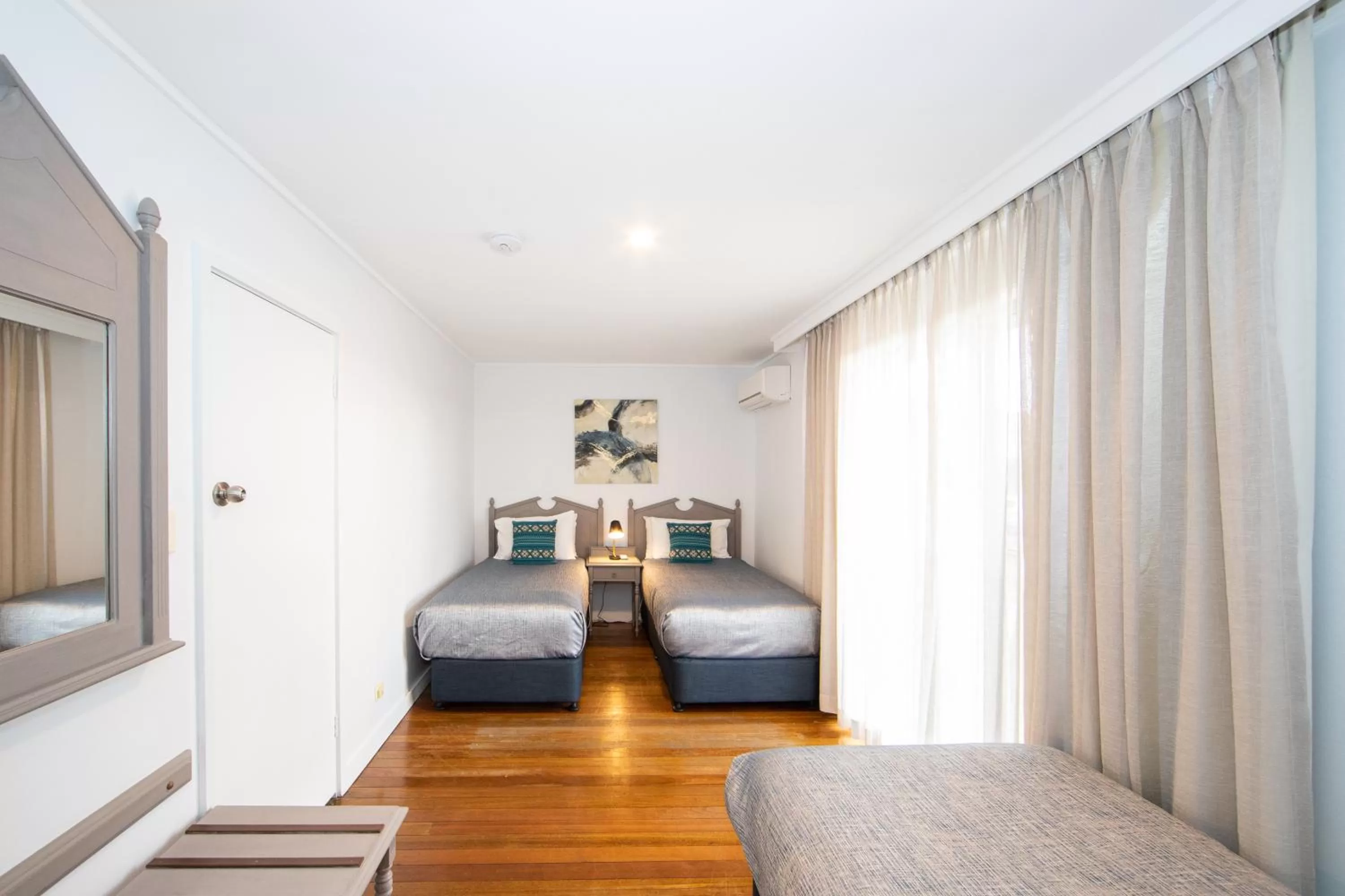 Bed in New England Motor Lodge