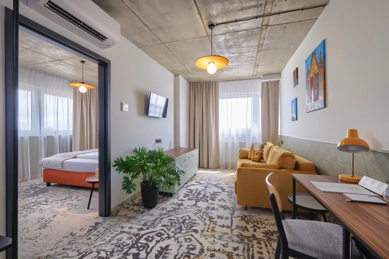 Living room, Bed in Arche Hotel Wrocław Airport