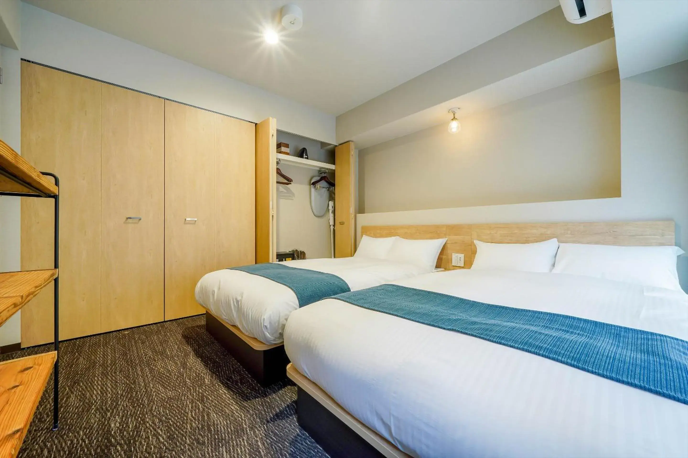 Bed in RESI STAY cotorune KYOTO