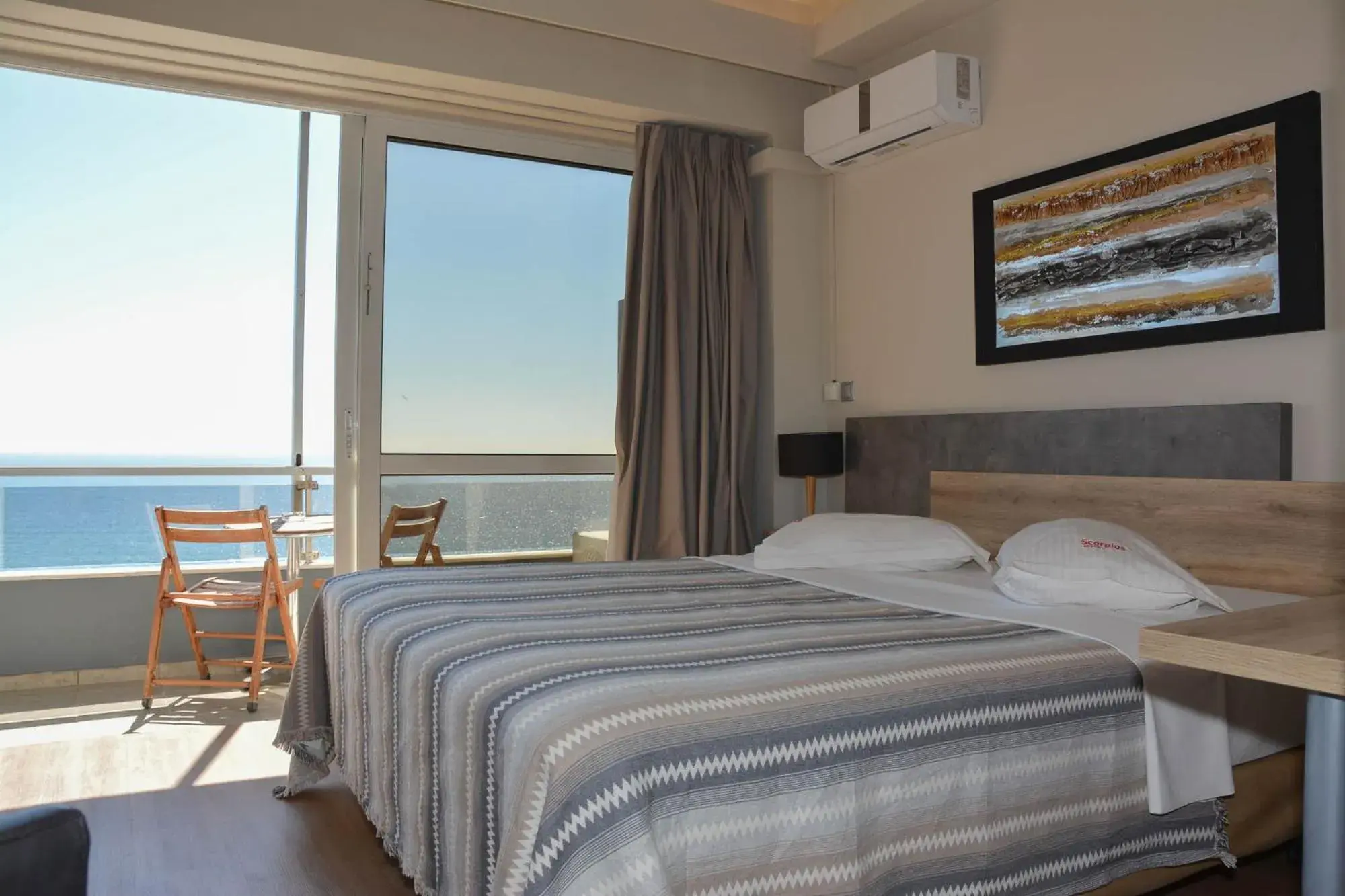 Bed in Scorpios Sea Side Hotel