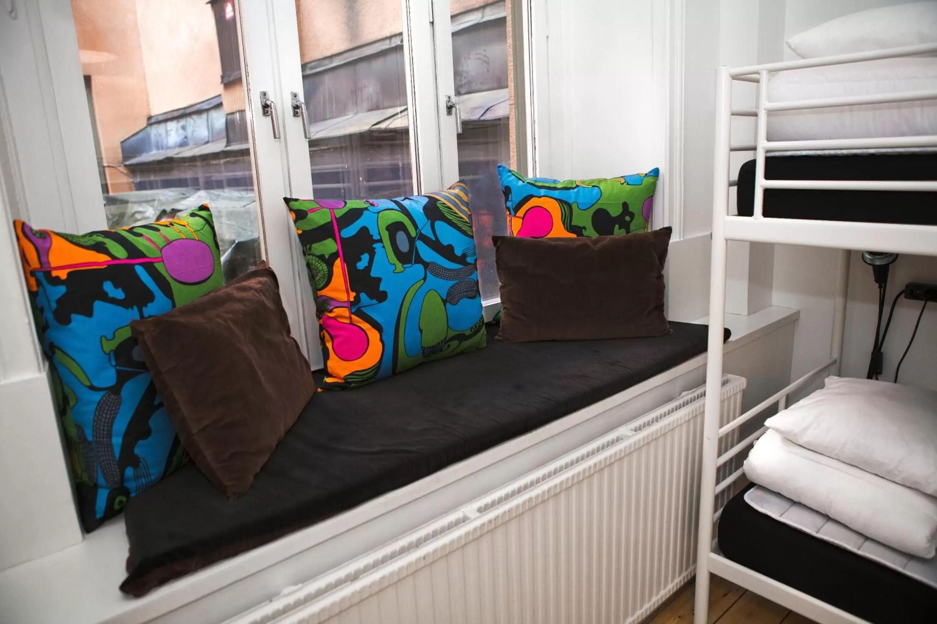 Seating area, Bunk Bed in City Backpackers Hostel