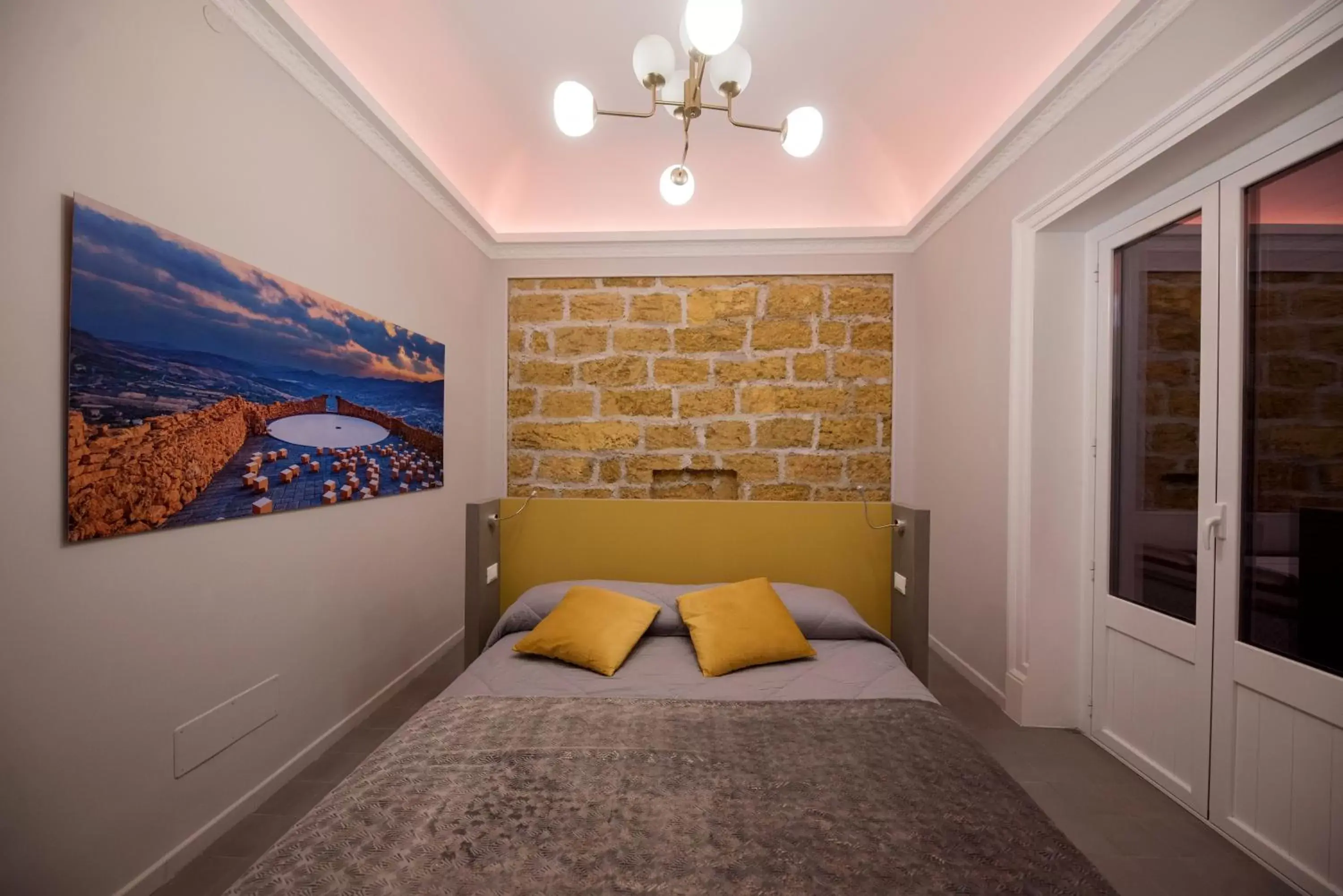 Bedroom, Seating Area in Suite del Ponte Normanno