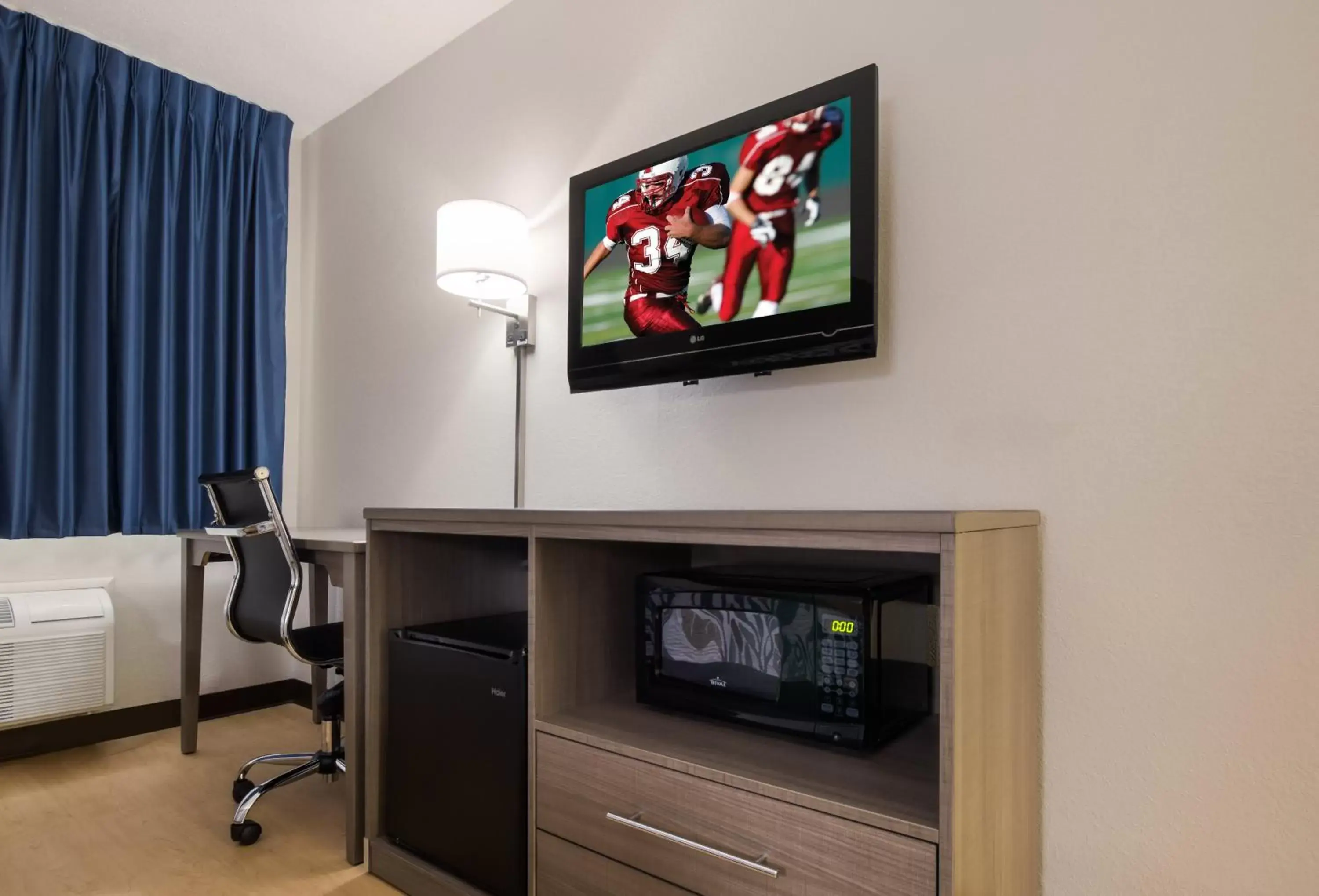 Photo of the whole room, TV/Entertainment Center in Red Roof Inn Lawrenceburg