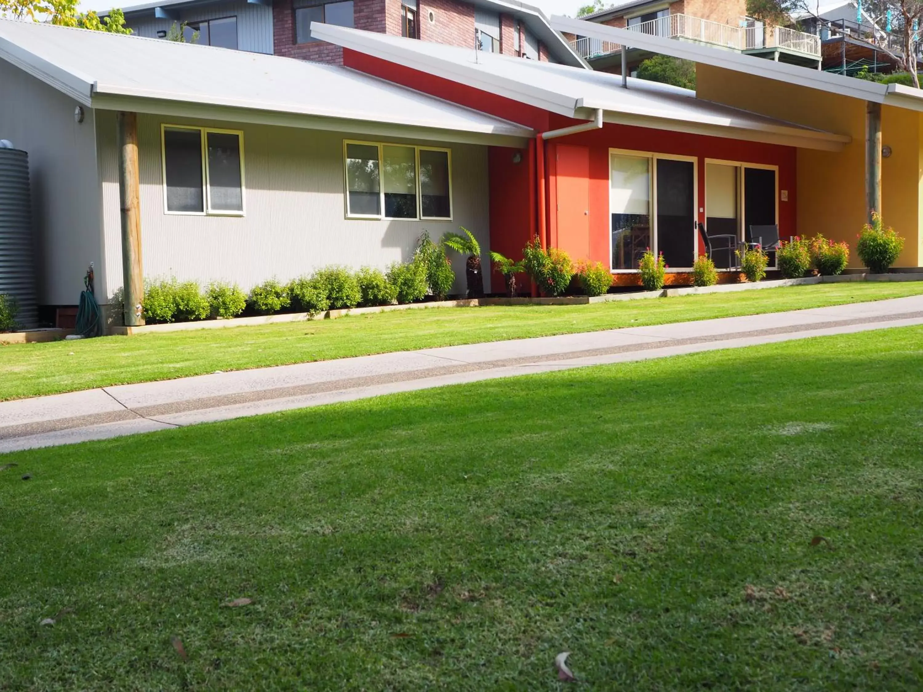 Garden view, Property Building in Tathra Beach House Holiday Apartments