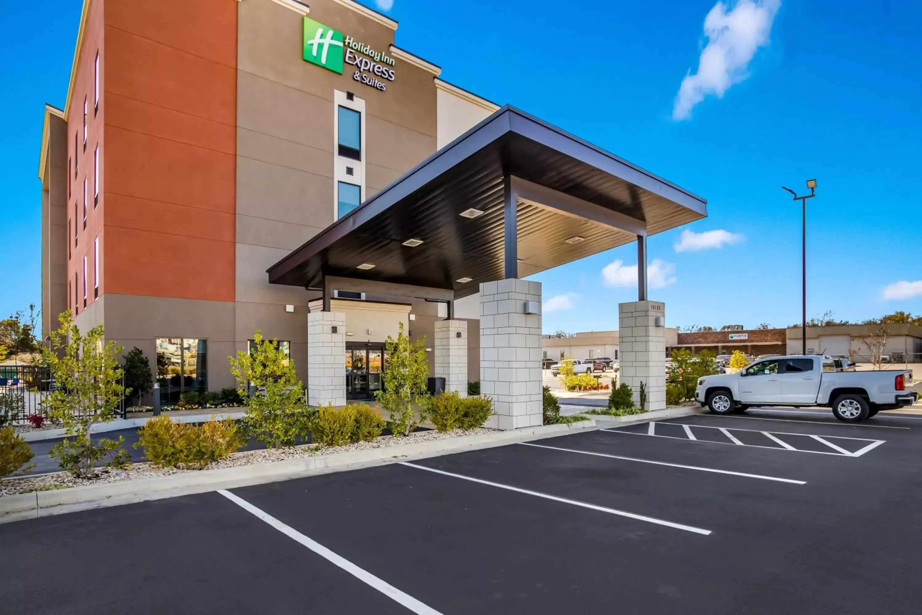 Property building in Holiday Inn Express & Suites Tulsa East - Catoosa, an IHG Hotel