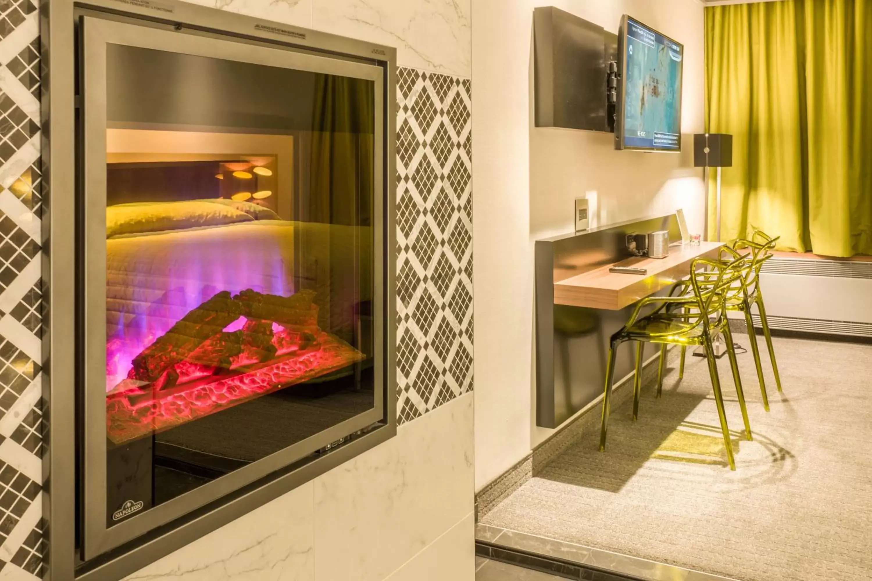 Seating area, TV/Entertainment Center in Le Chabrol Hotel & Suites