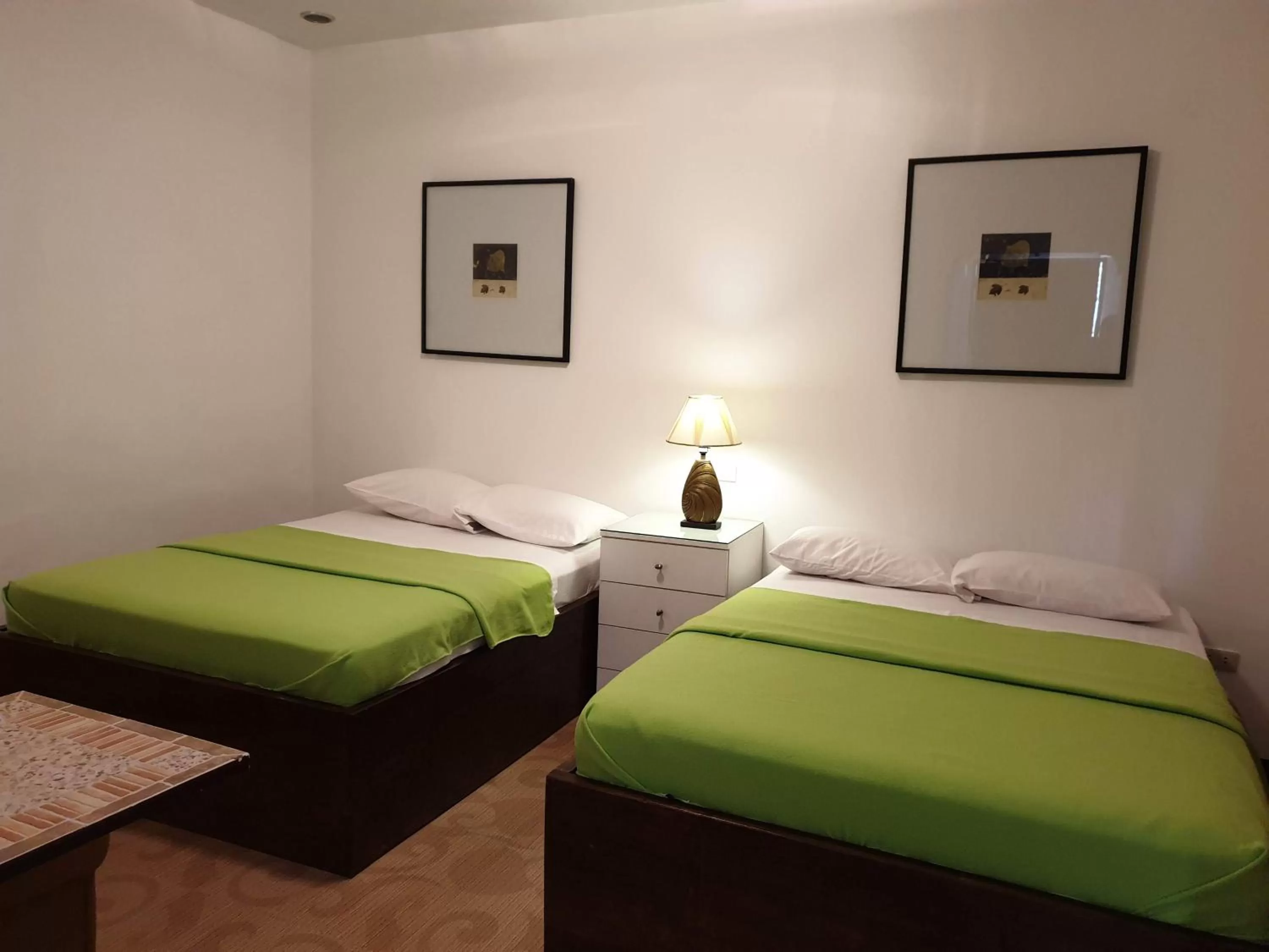 Bed in Raya Del Sol Dive Resort