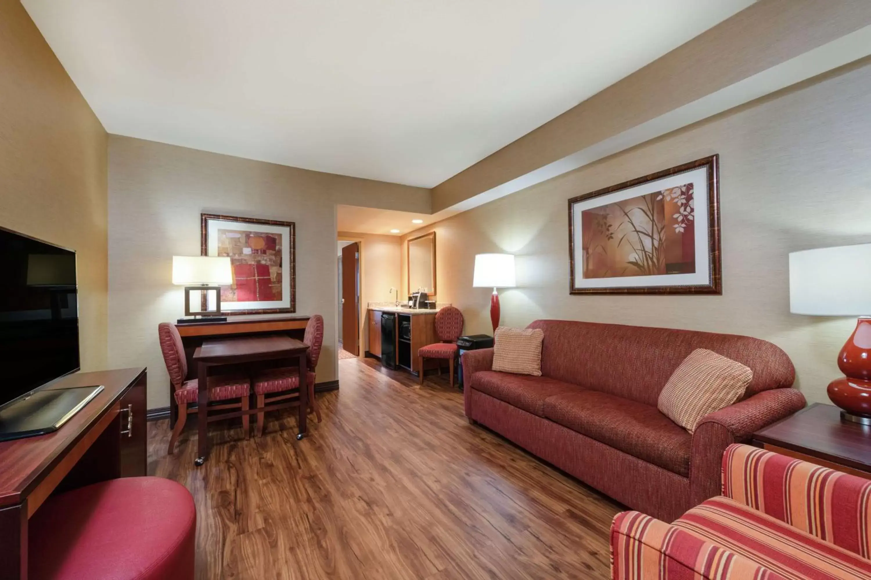 Bedroom, Seating Area in Embassy Suites Loveland Hotel, Spa & Conference Center