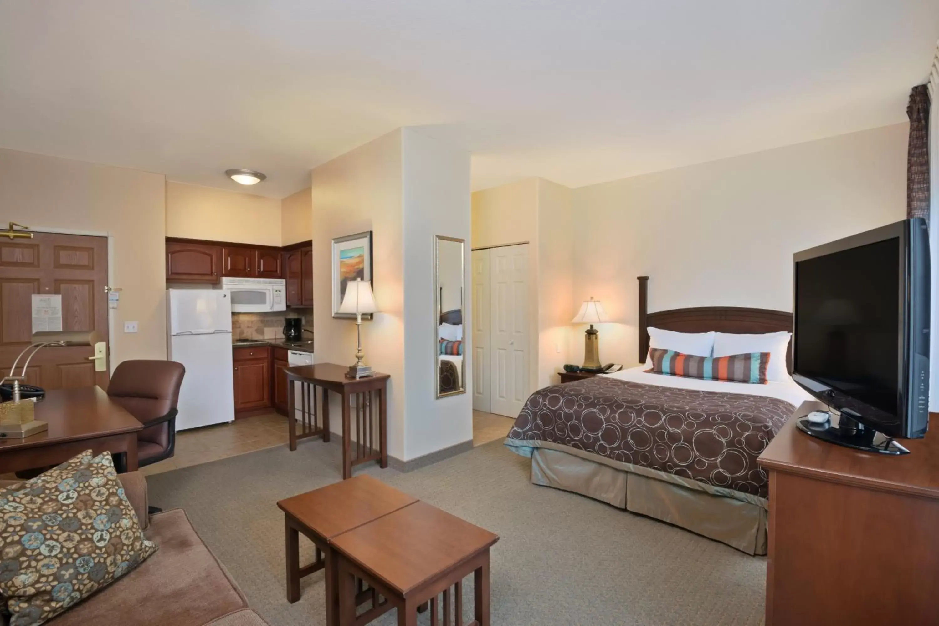 Photo of the whole room, TV/Entertainment Center in Staybridge Suites Tucson Airport, an IHG Hotel