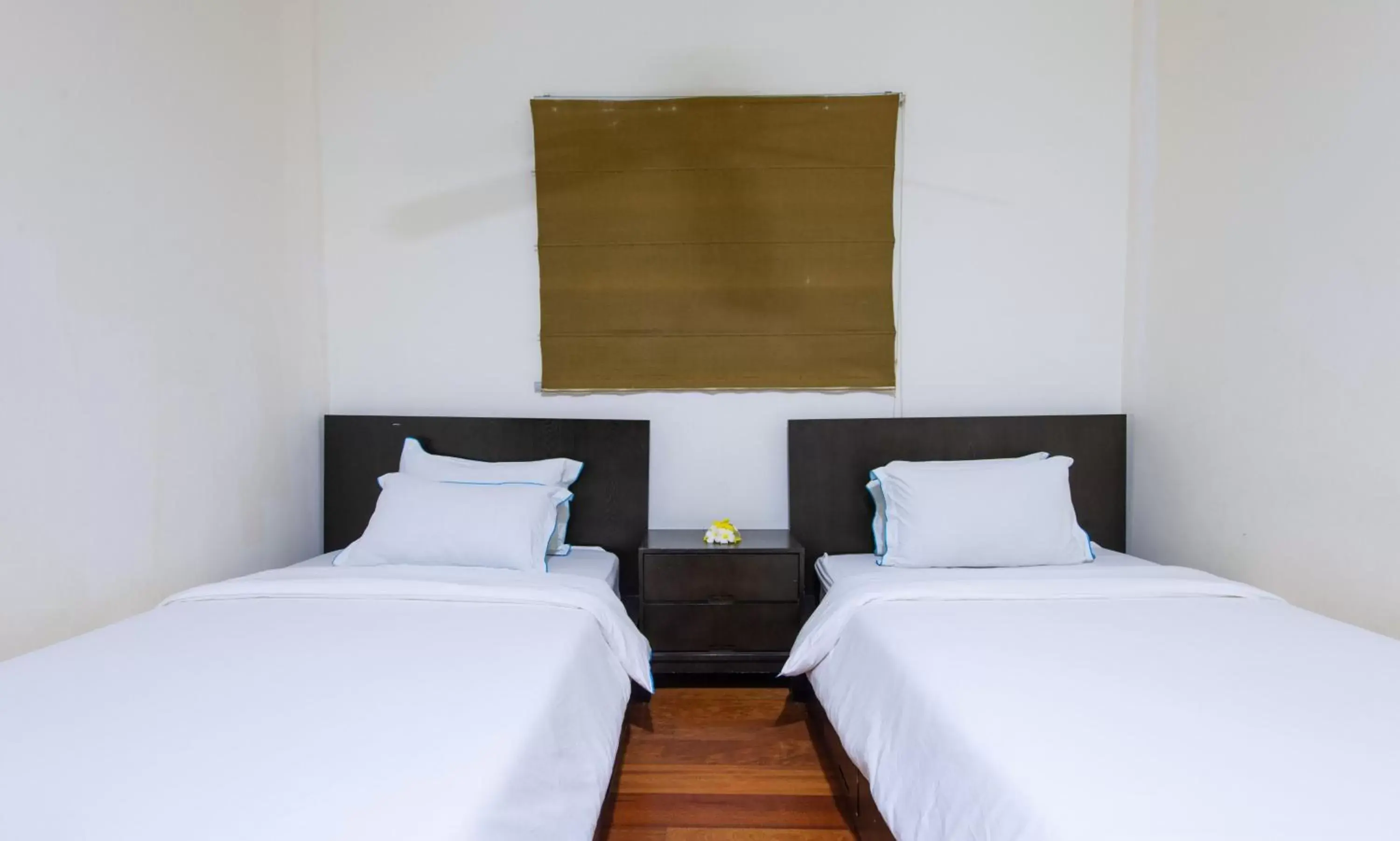 Bed in Sabah Beach Villas & Suites