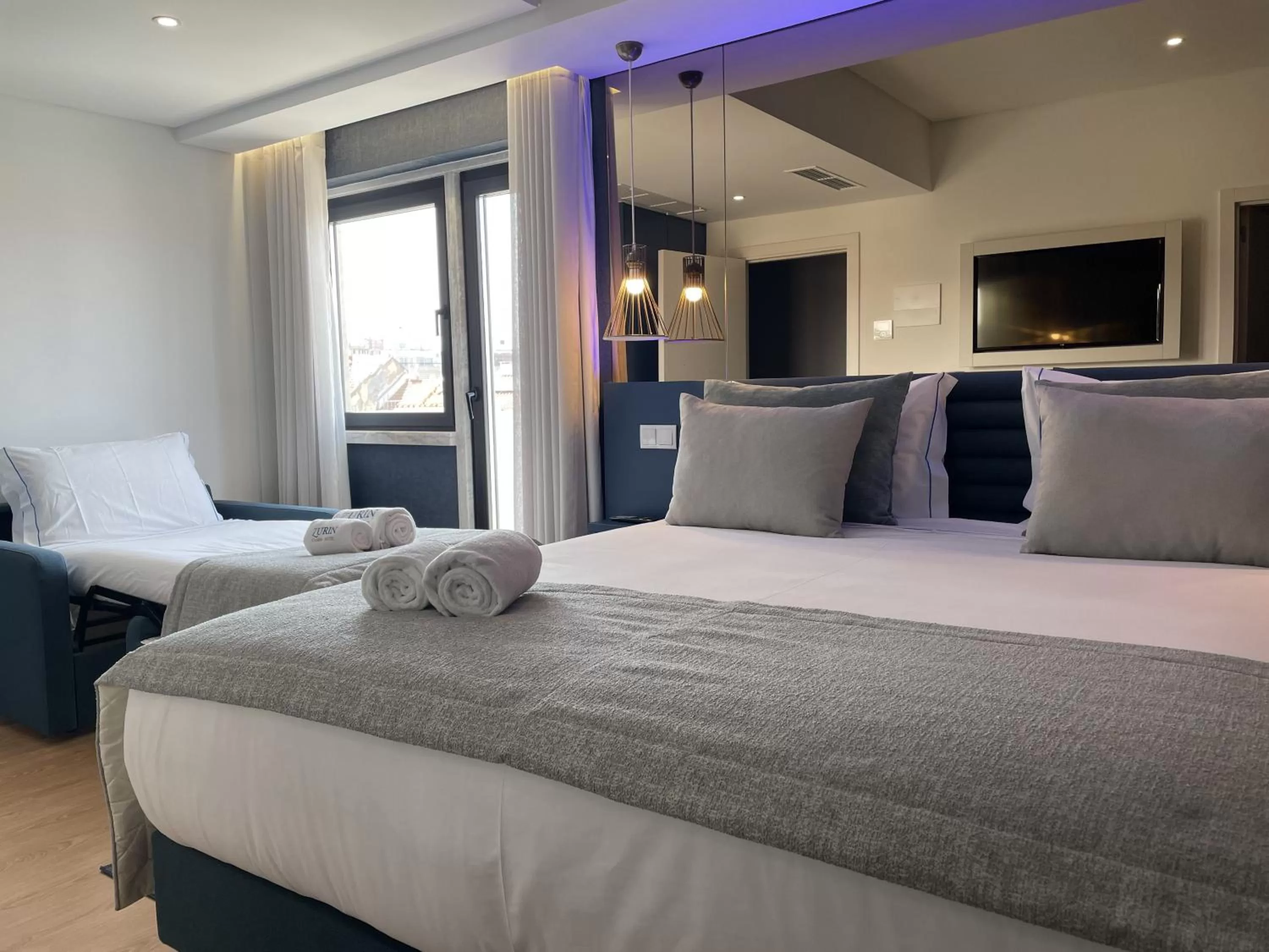 Bed in Zurin Charm Hotel