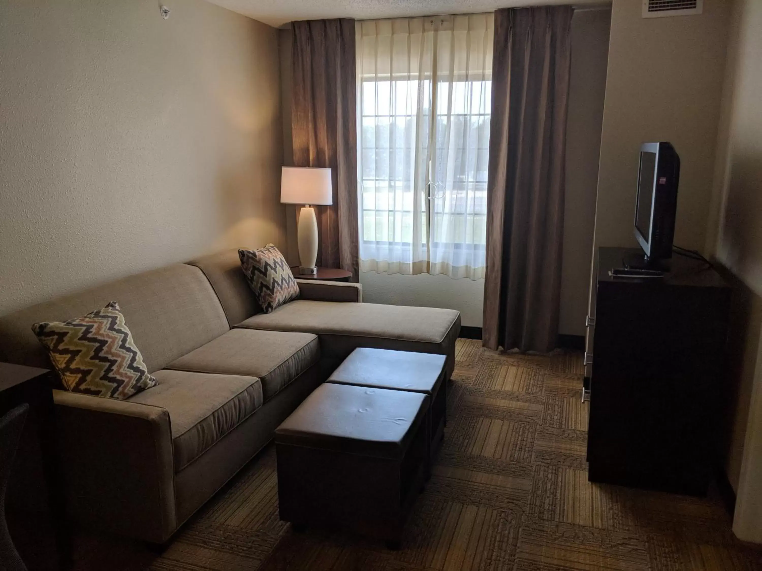 Photo of the whole room, Seating Area in Staybridge Suites Grand Rapids-Kentwood, an IHG Hotel