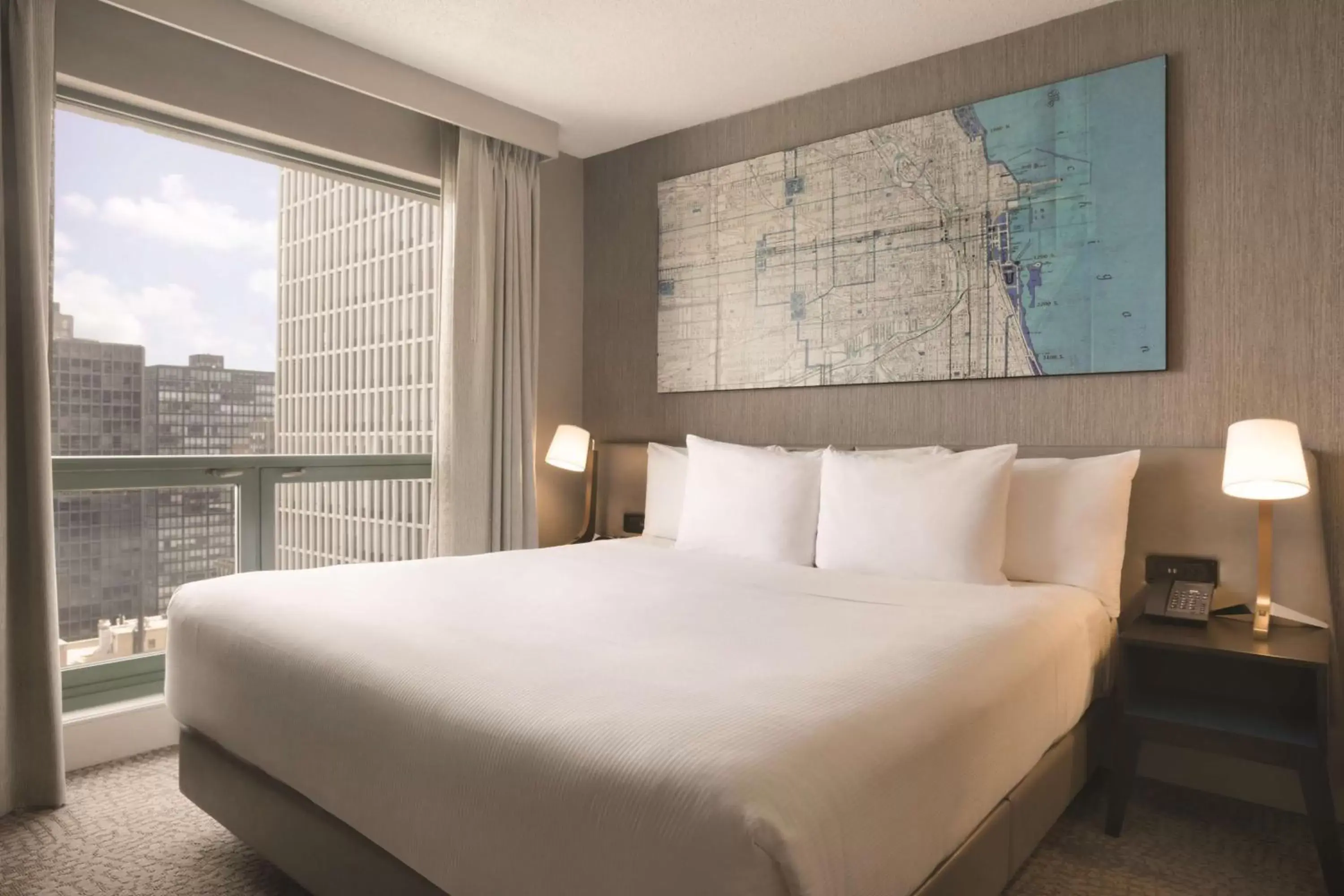 Bed in Hilton Chicago Magnificent Mile Suites