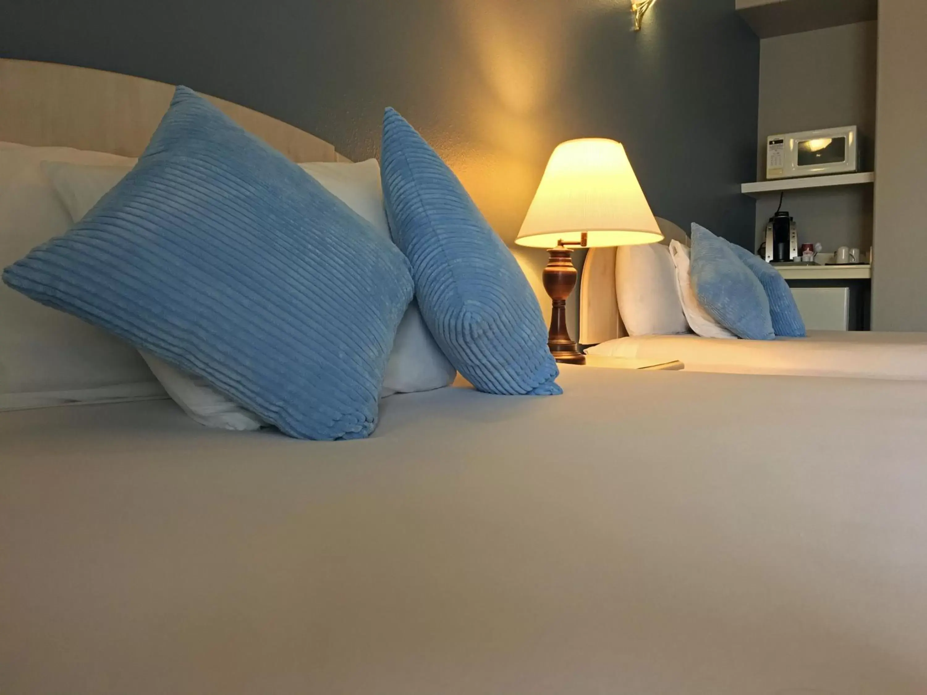 Bed in The Oceanfront Inn