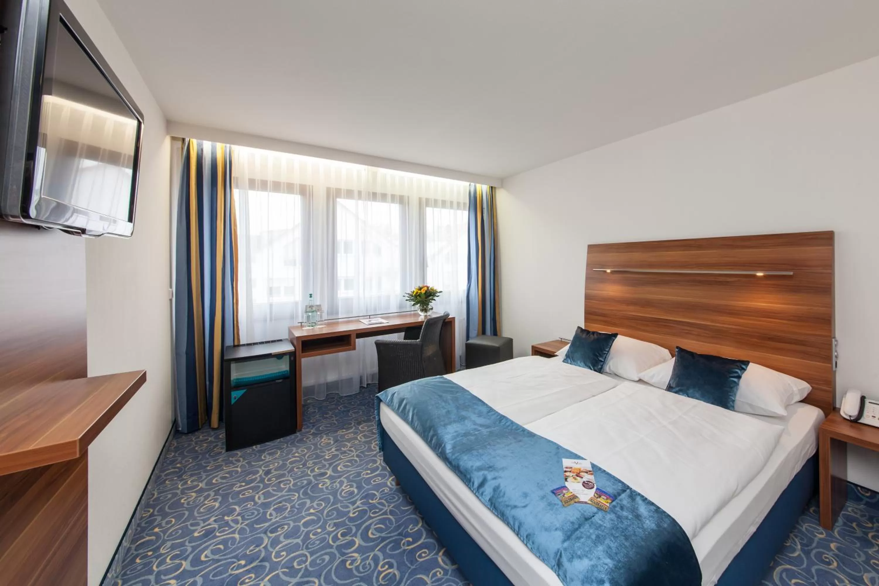 Photo of the whole room, Bed in Hotel Strohgäu