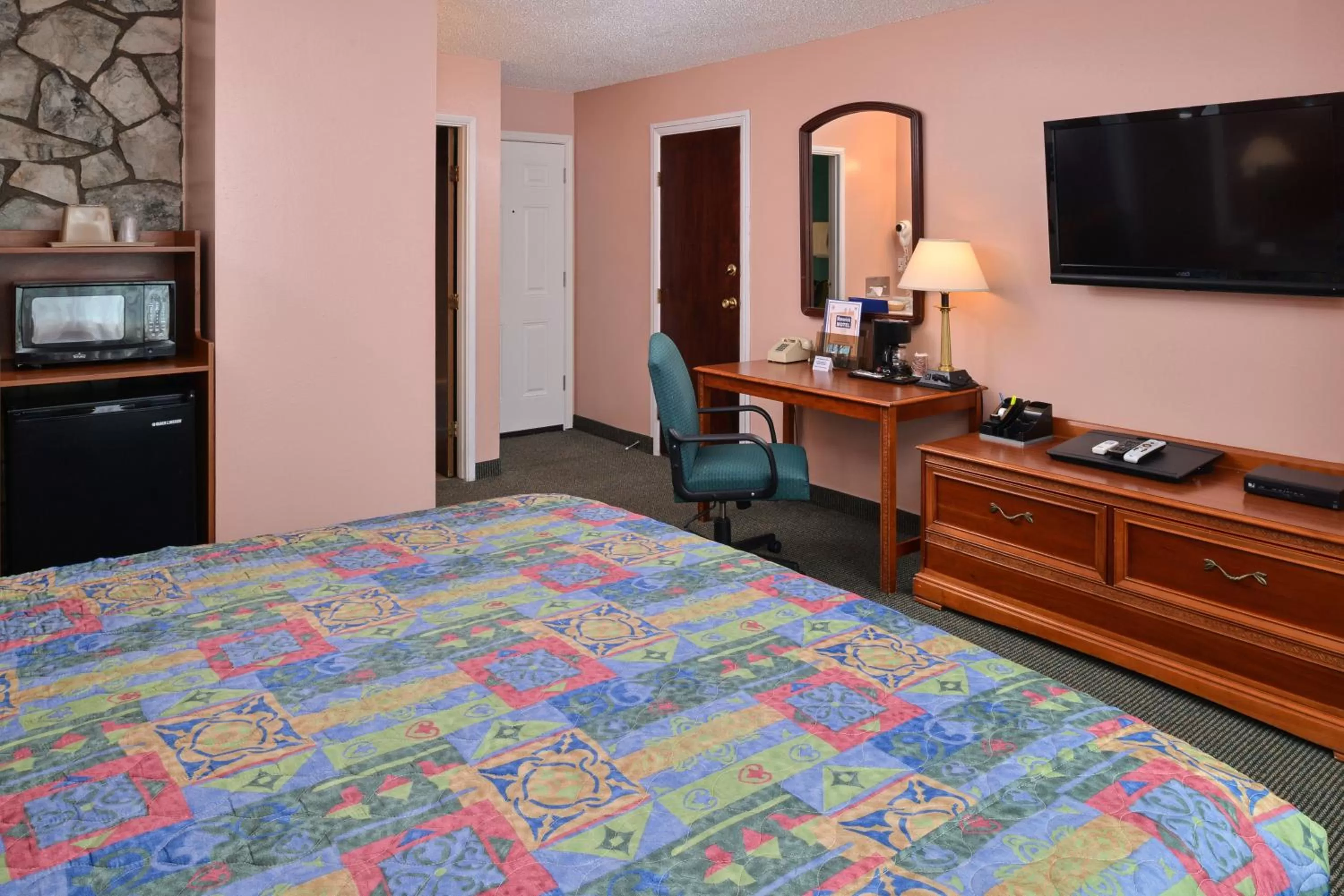 Decorative detail, Bed in Maverick Motel - Modern Renovated Motel