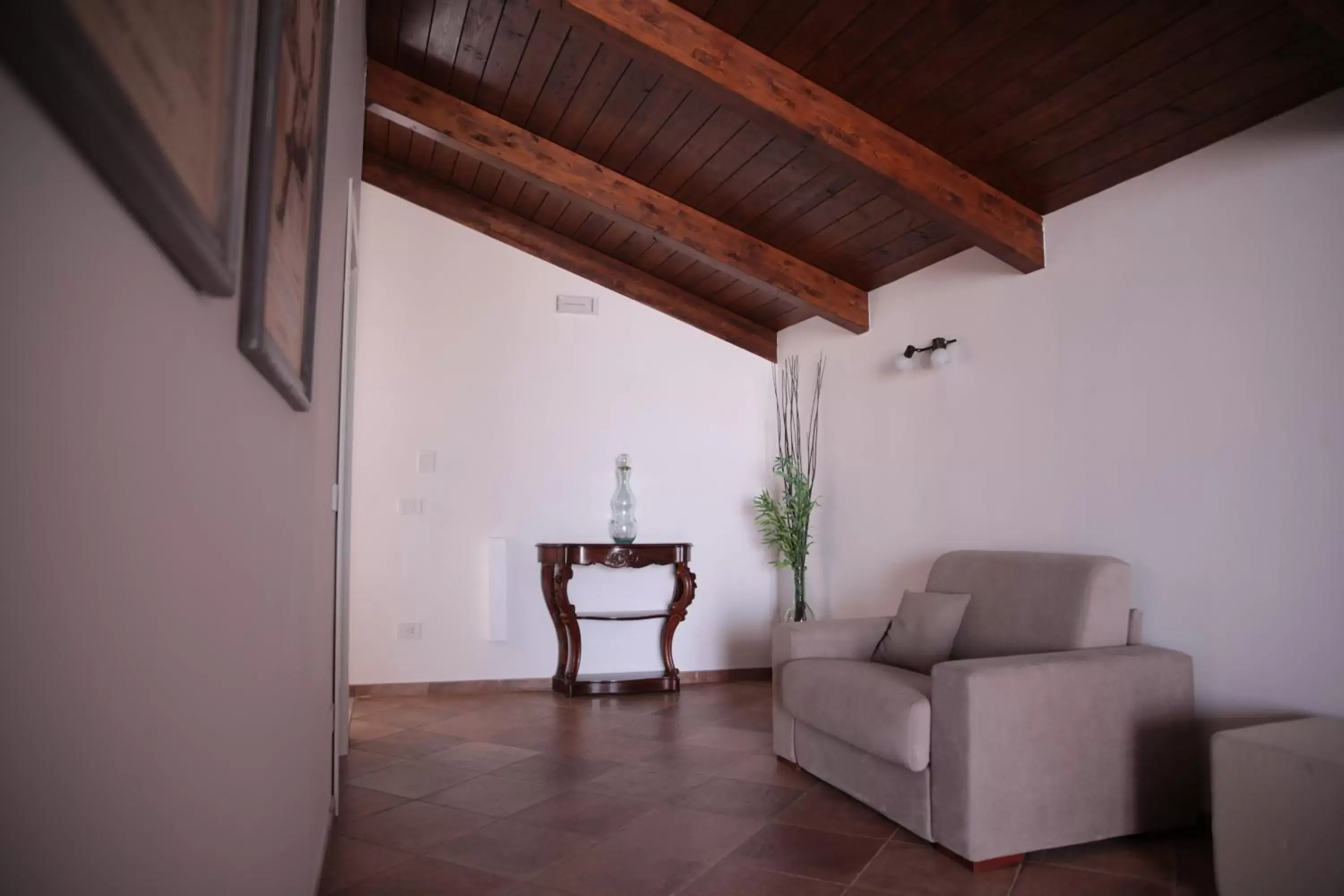 Photo of the whole room, Seating Area in Palazzo Caracciolo del Sole