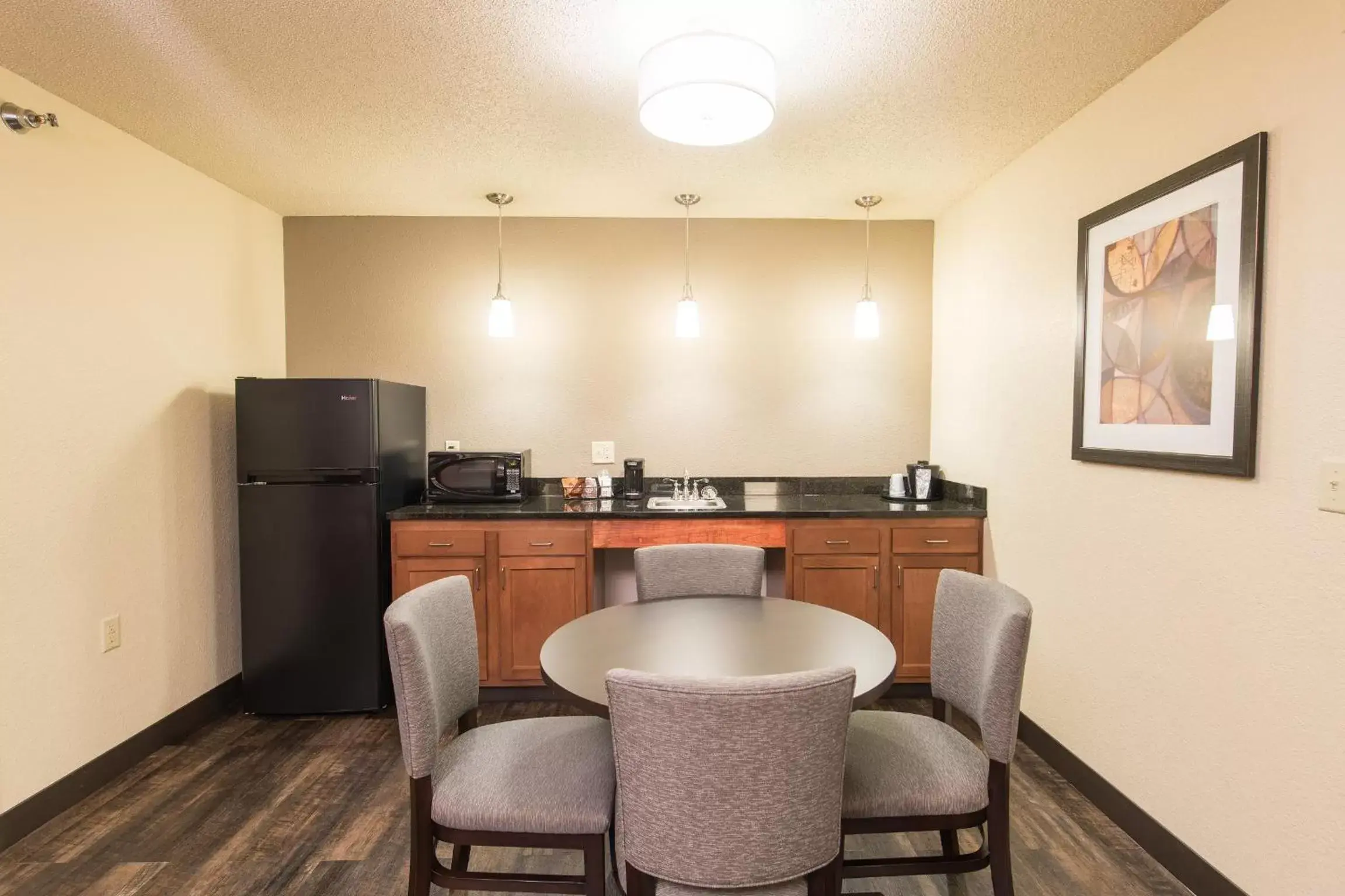 Kitchen or kitchenette, Kitchen/Kitchenette in AmericInn by Wyndham Mounds View Minneapolis