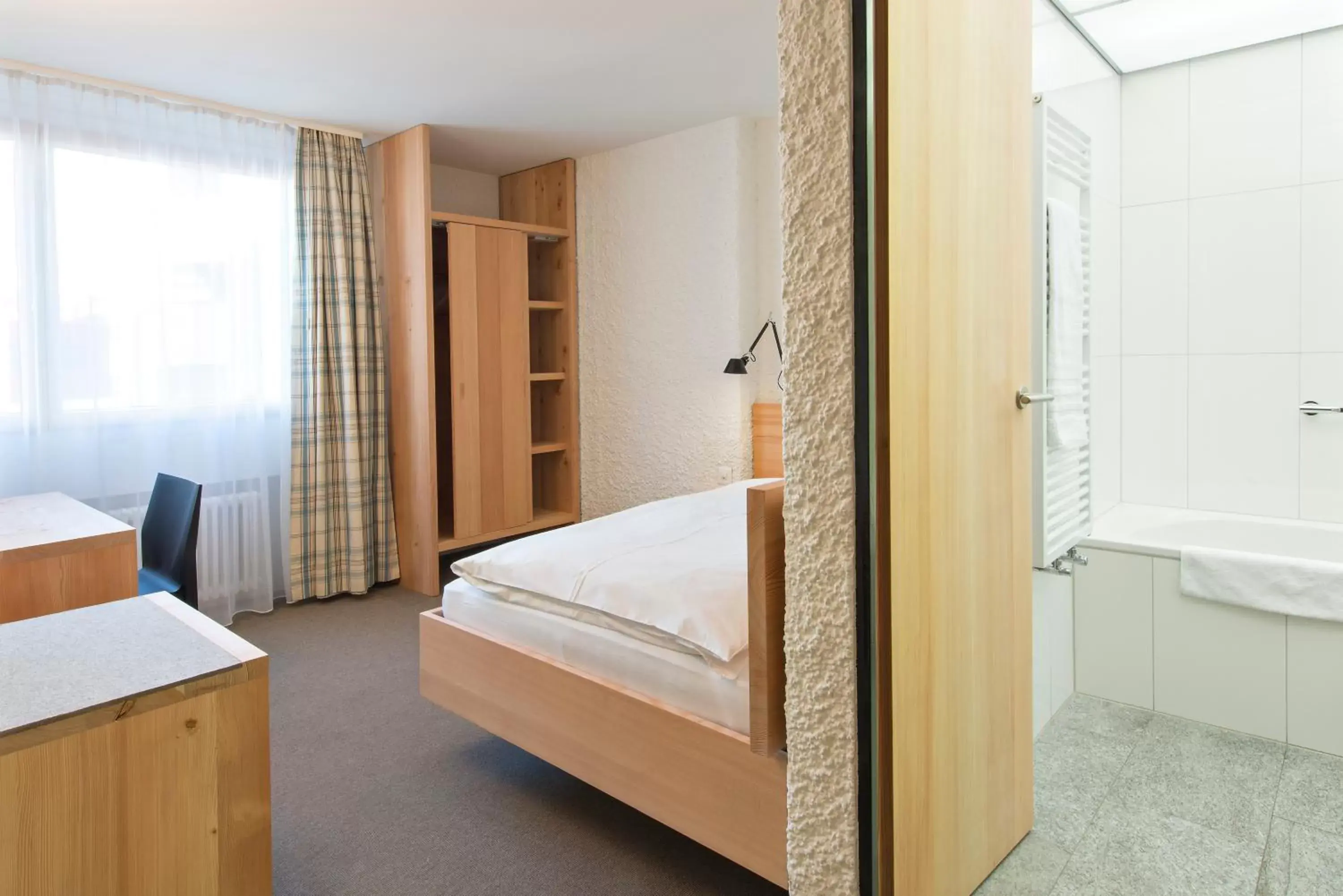 Bedroom, Bed in Hauser Hotel St. Moritz