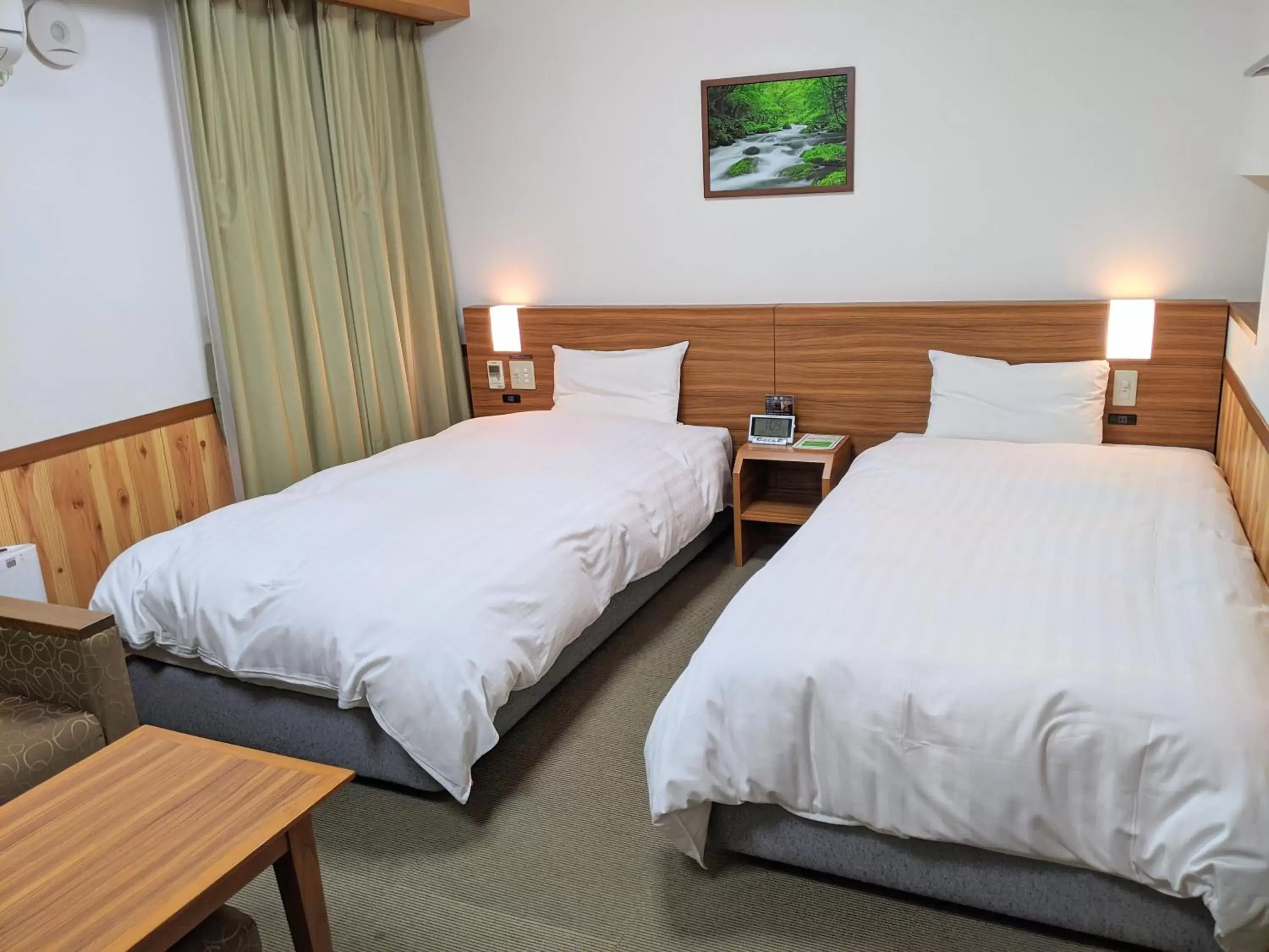 Bed in Dormy Inn Premium Sapporo