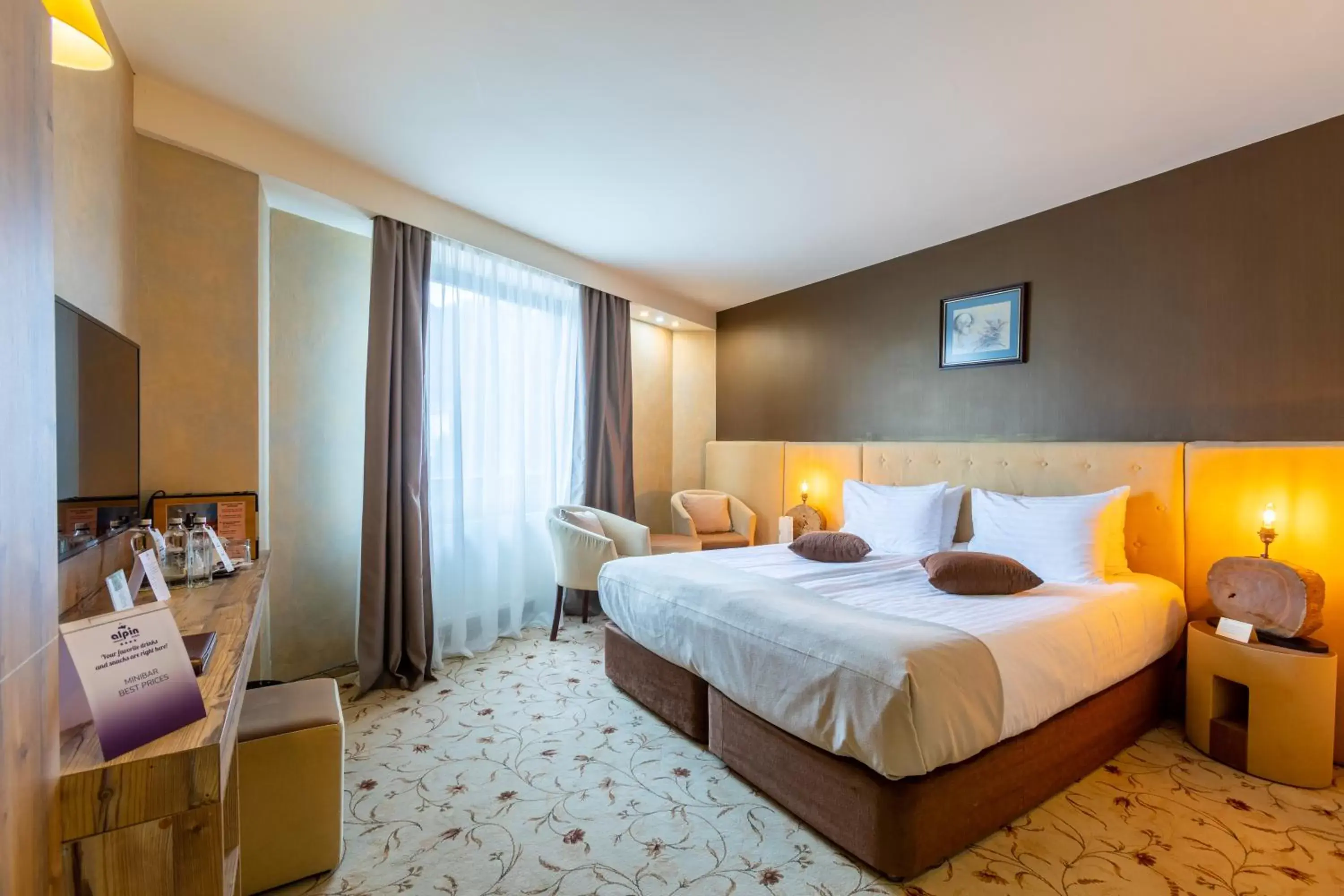 Bed in Alpin Resort Hotel