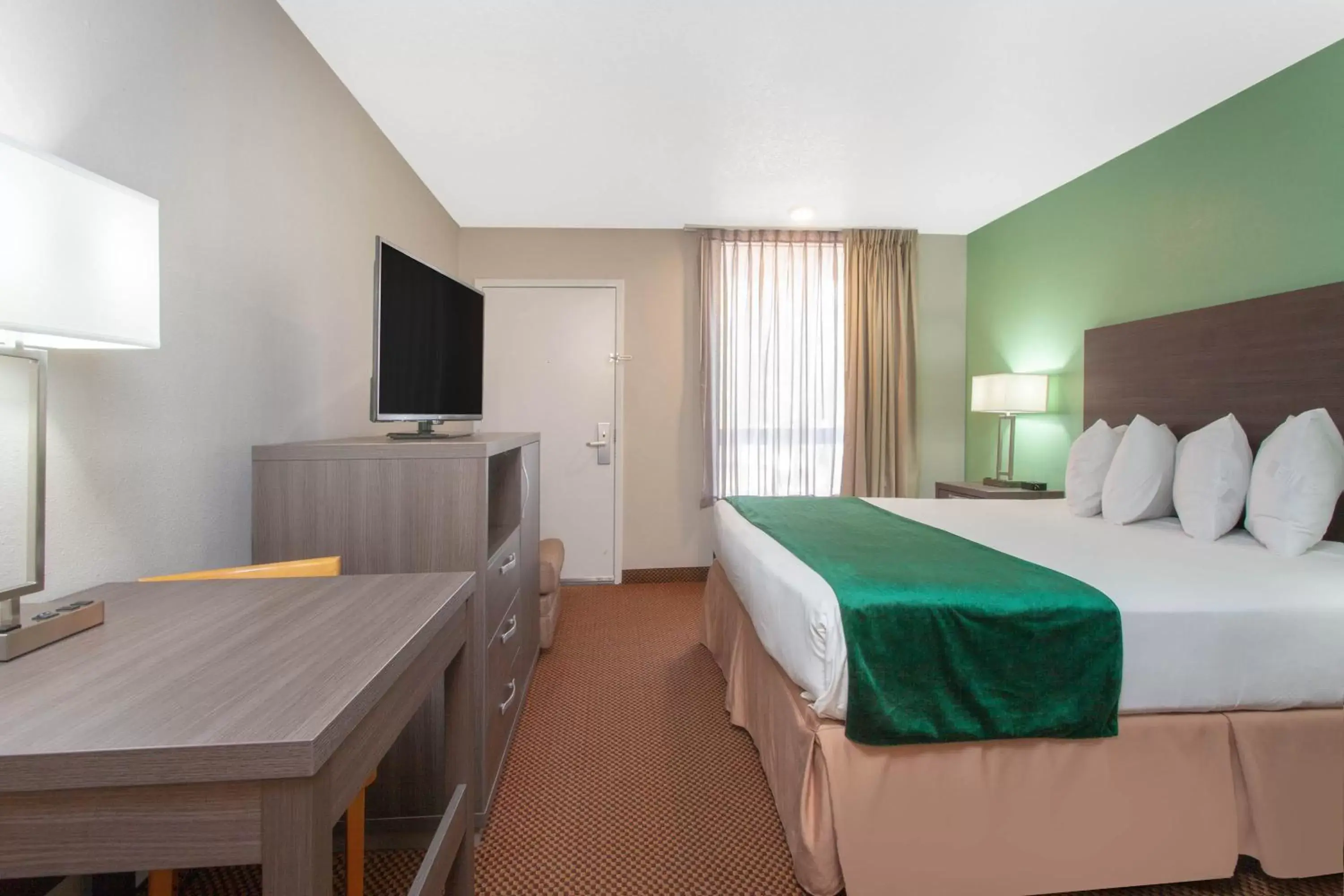 Bedroom in Grand Hotel Orlando at Universal Blvd