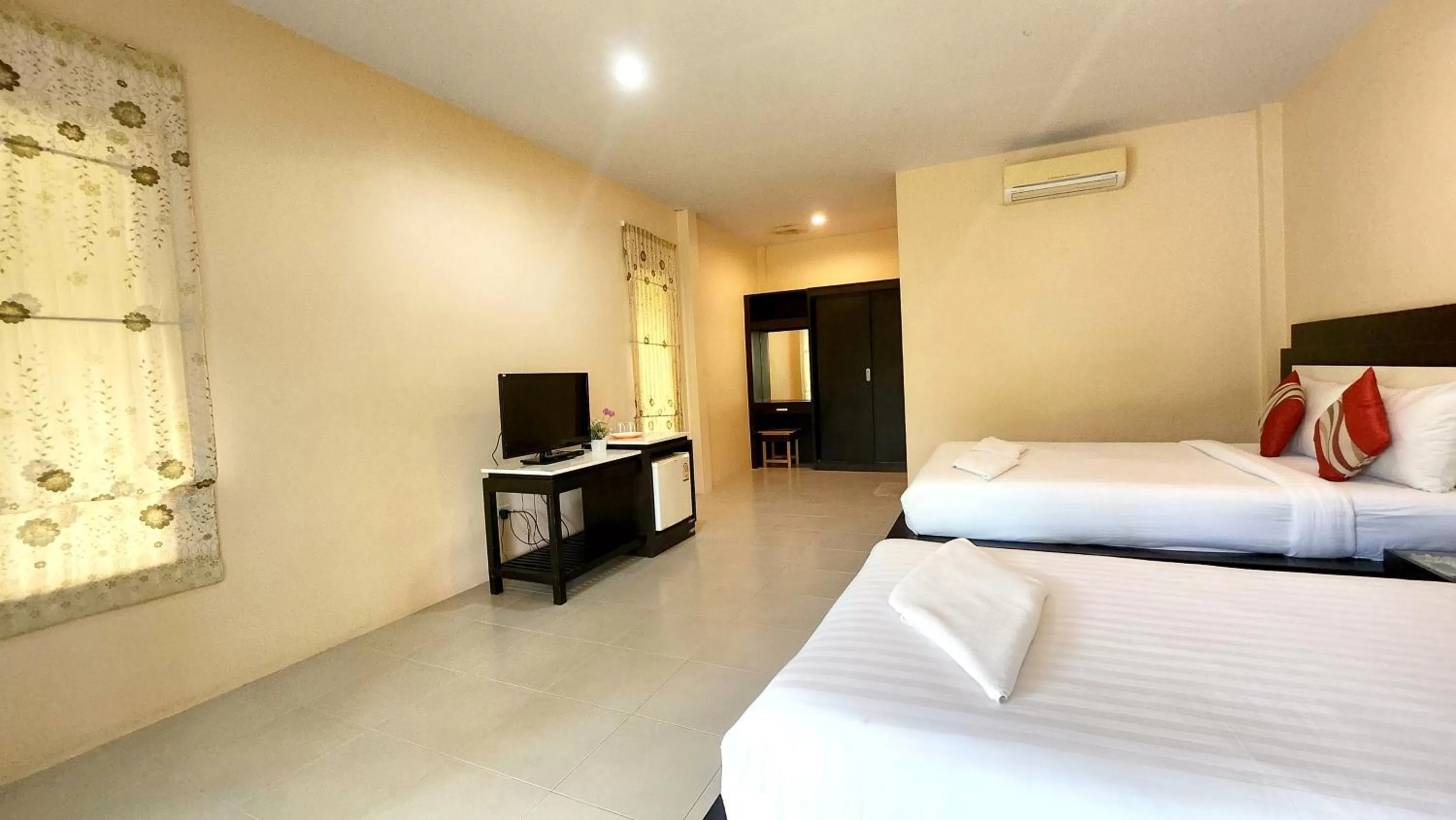 Bed in Sawaddee Aonang Resort