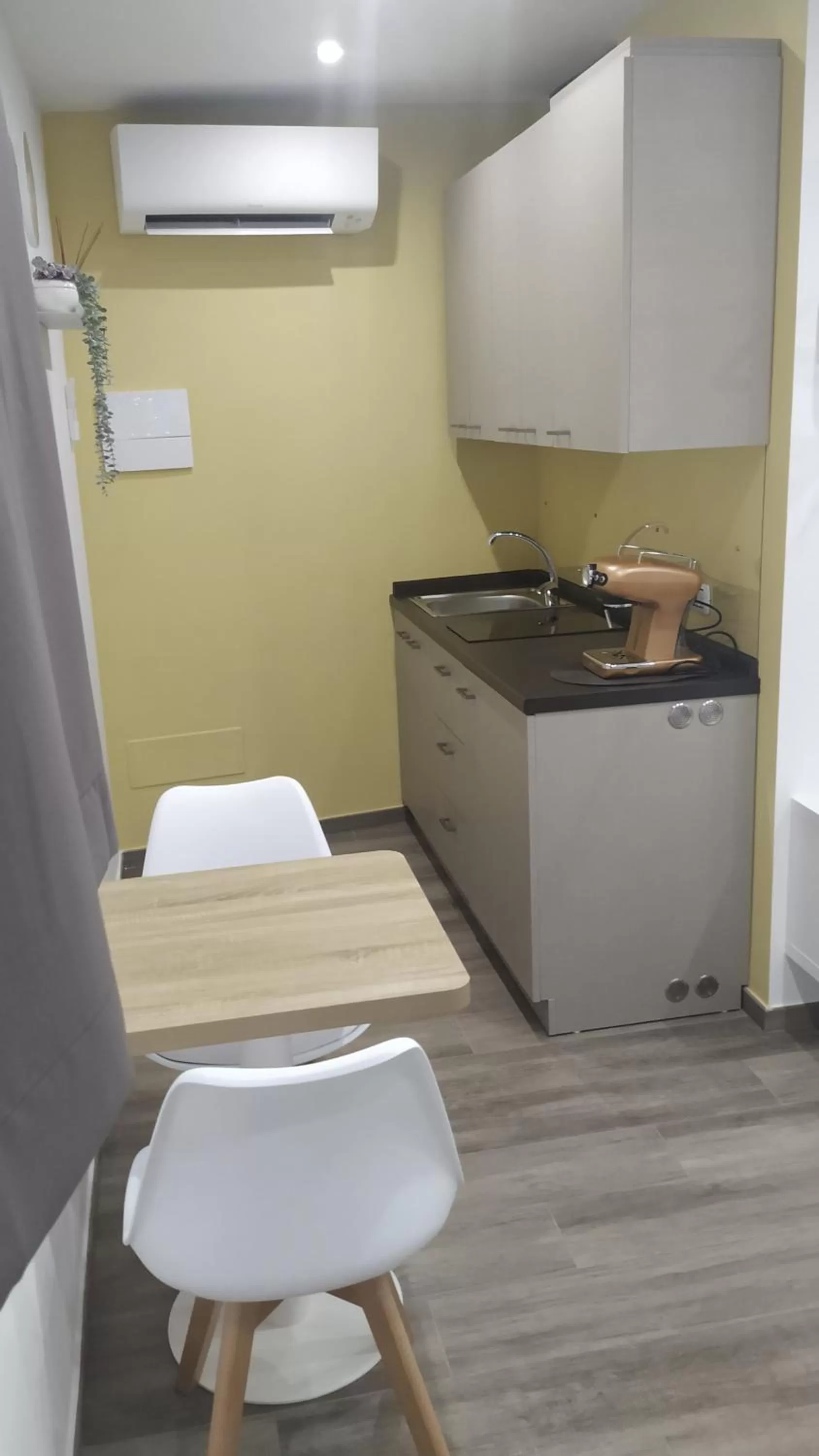 Kitchen or kitchenette in Comeacasa B&B