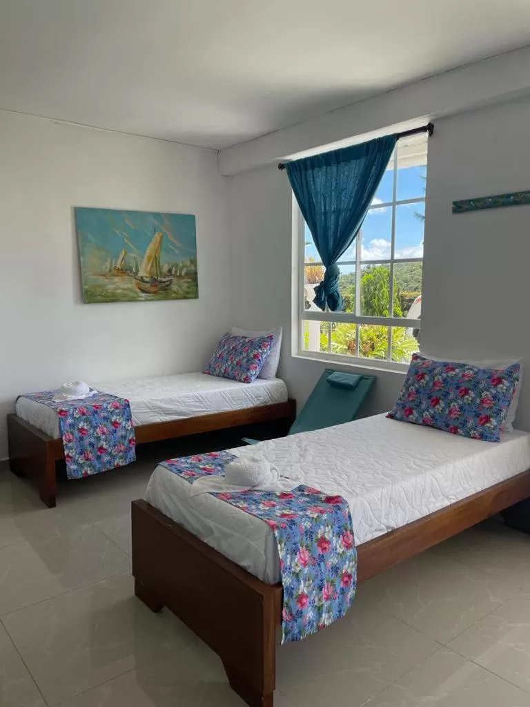 Bed in Paradise Lake Finca Hotel