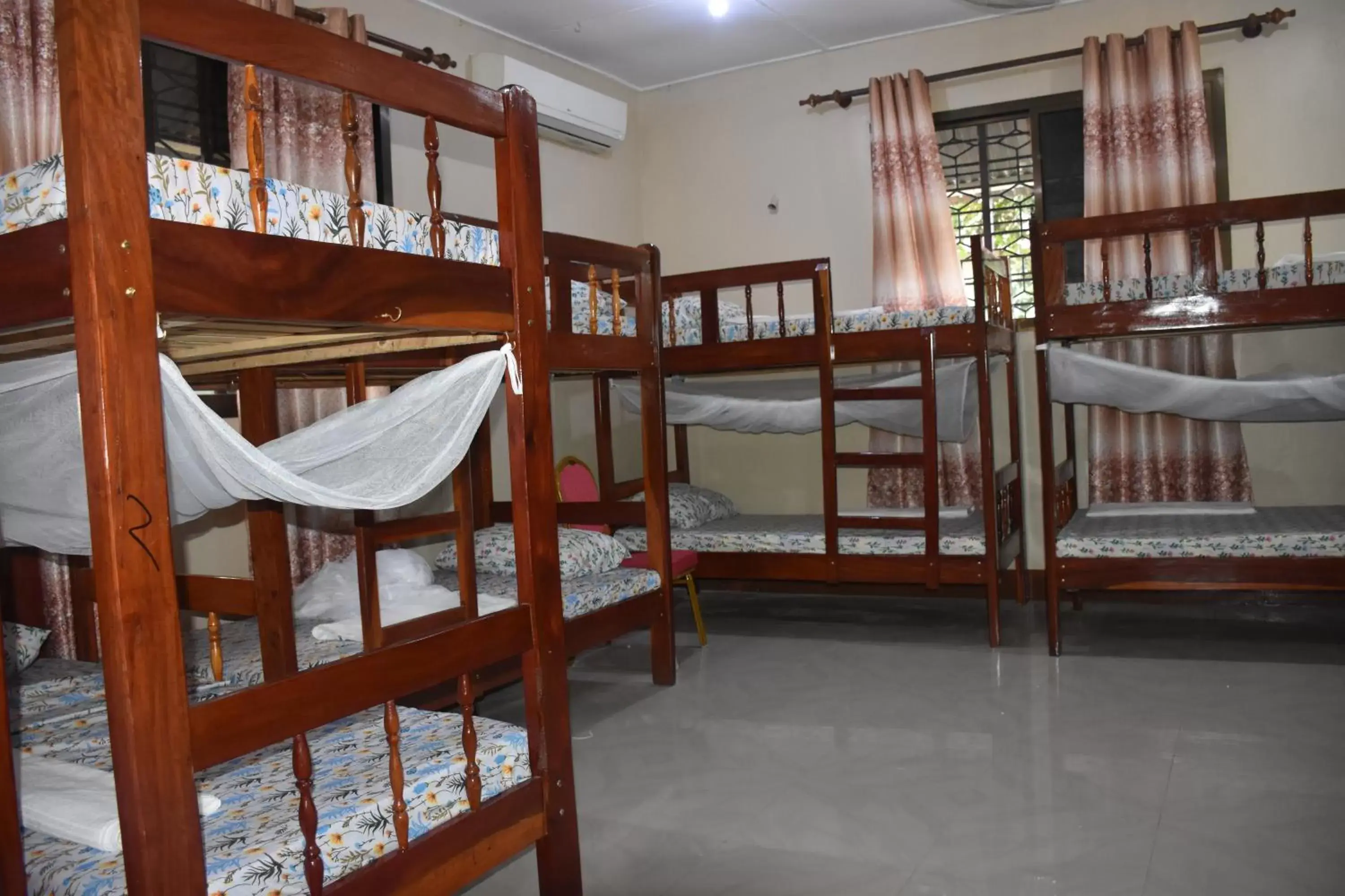 Bed in 8-Bed Dormitory Room in L&J Modern Backpackers Kinondoni Bed in 8-Bed Dormitory Room in L&J Modern Backpackers Kinondoni