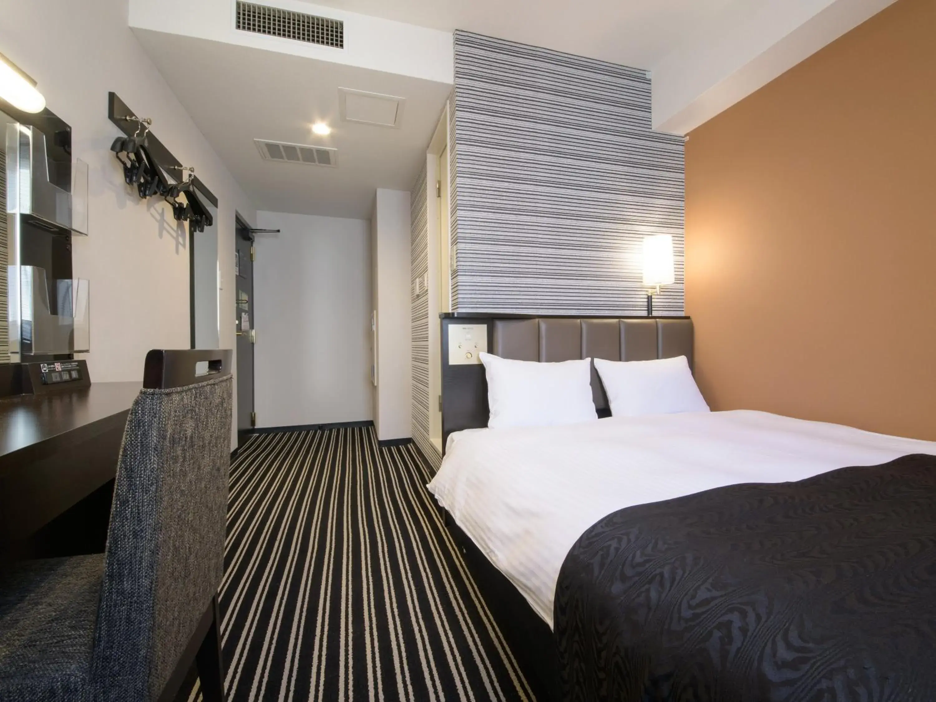 Bed in APA Hotel TKP Sapporo Ekimae Bed in APA Hotel TKP Sapporo Ekimae