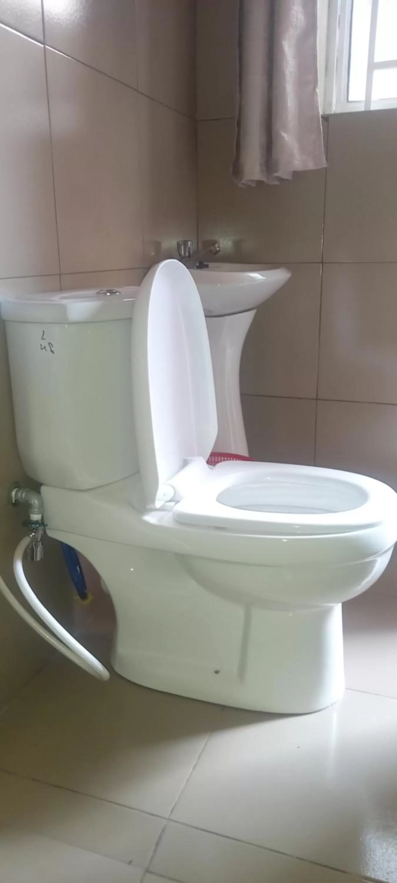 Bathroom in Tommy's Budget Rooms