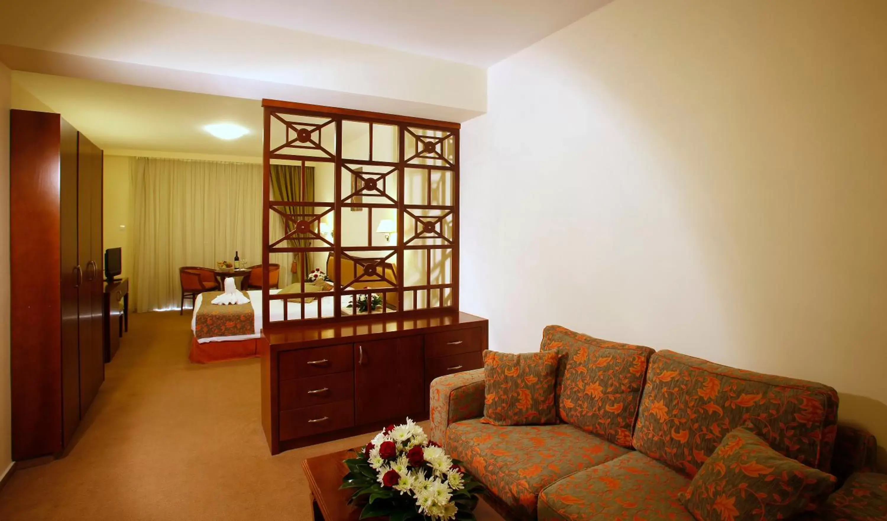 Bedroom, Seating Area in Aquamare Beach Hotel & Spa