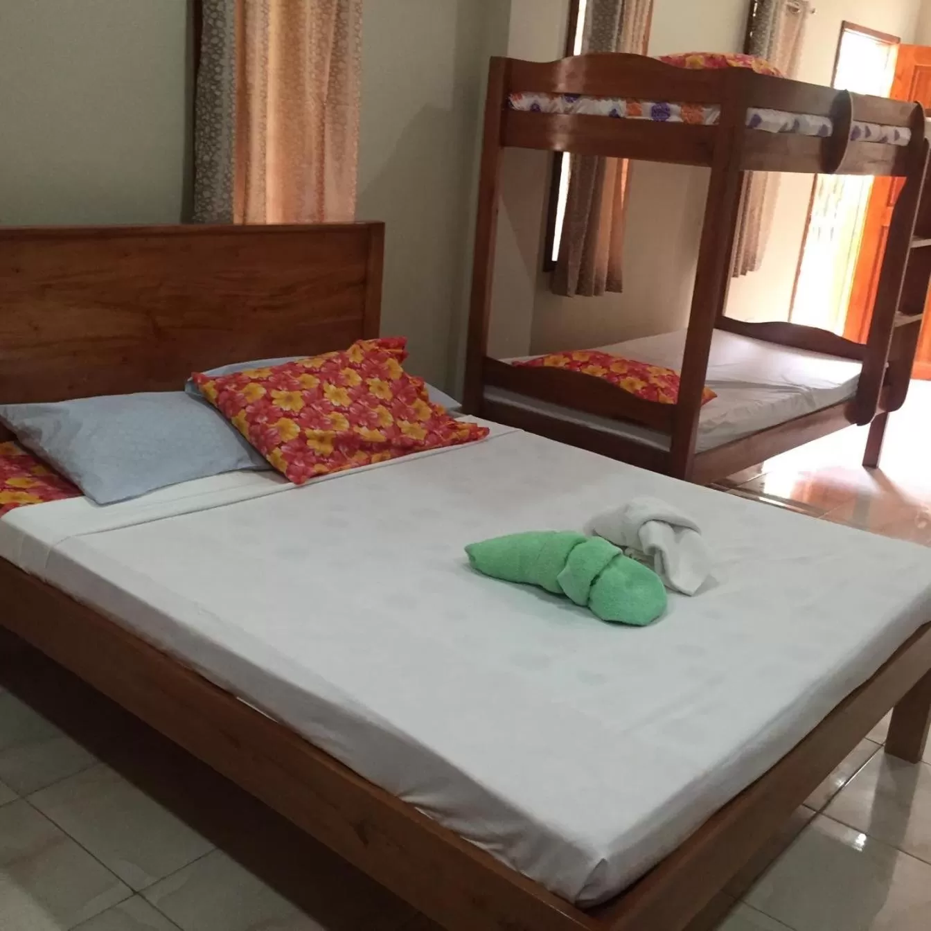 Bed in D's Oceanview Beach Resort