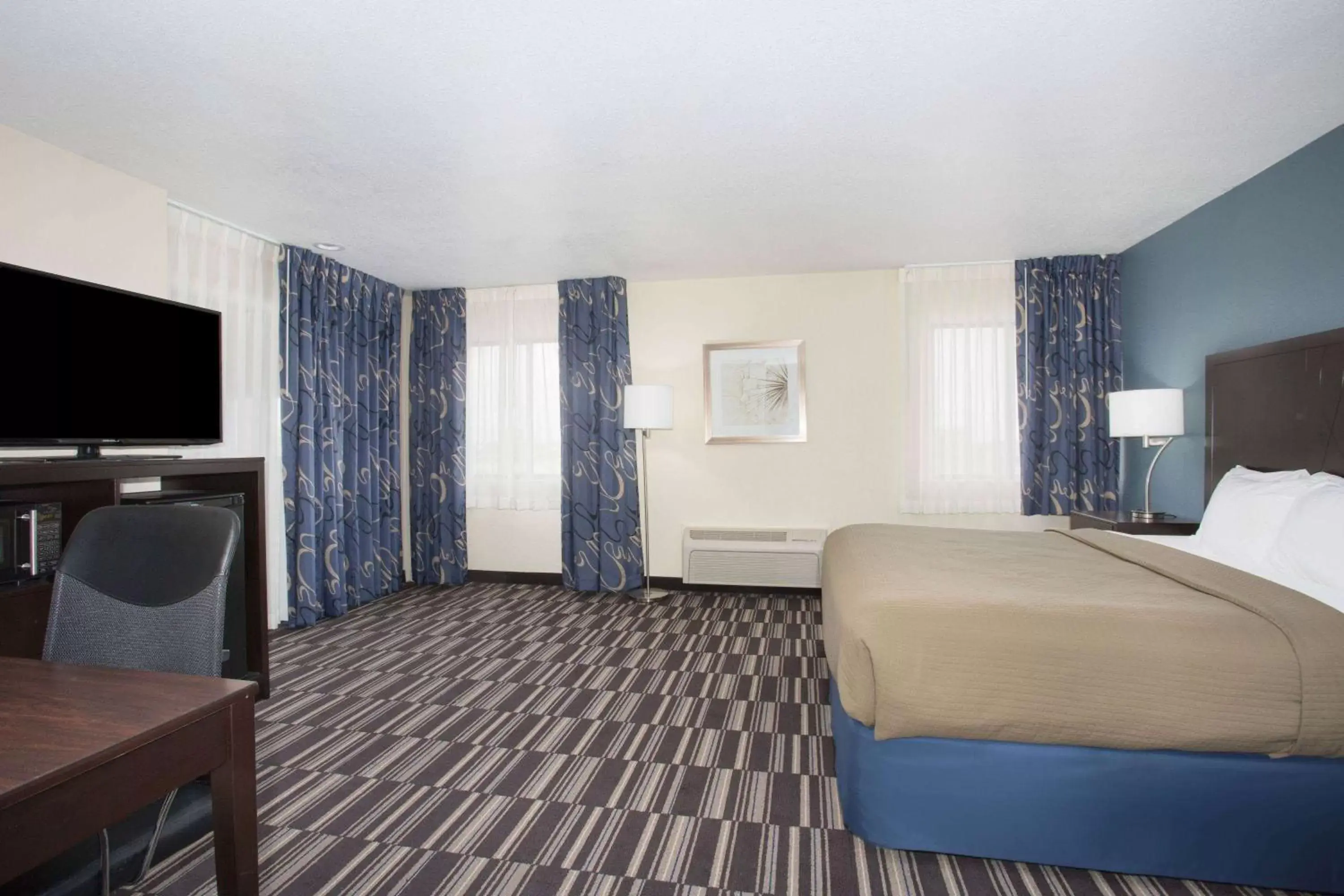 Photo of the whole room, Bed in AmericInn by Wyndham Mount Pleasant