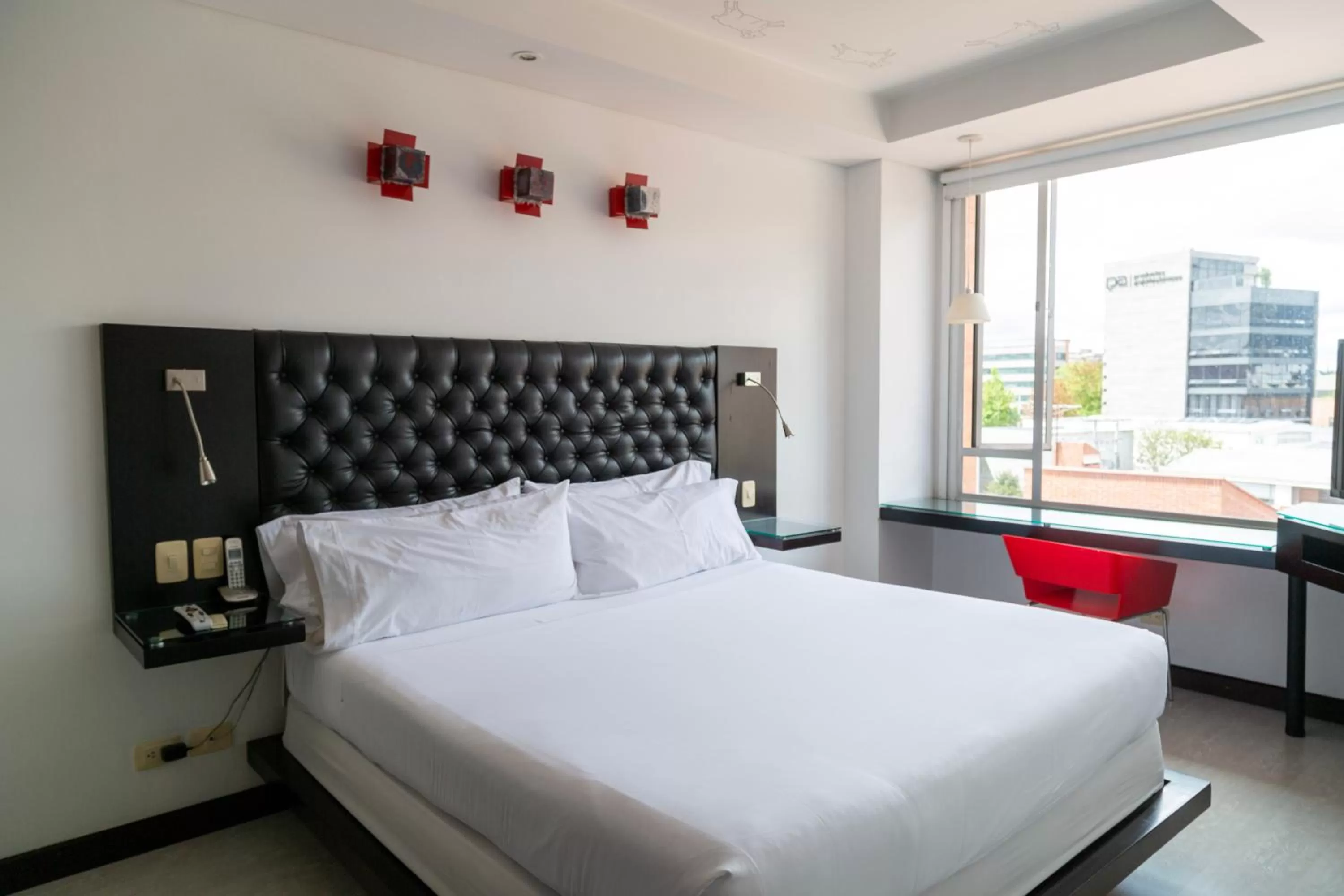 Bed in Hotel 104 Art Suites