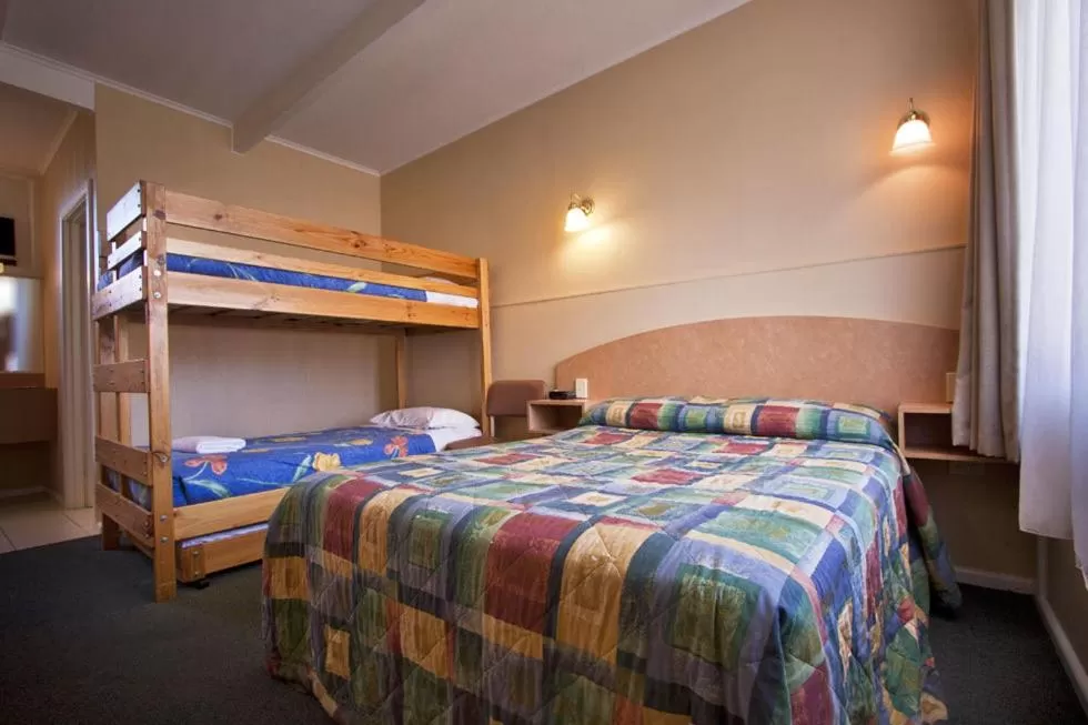 Bed in Parkville Motel