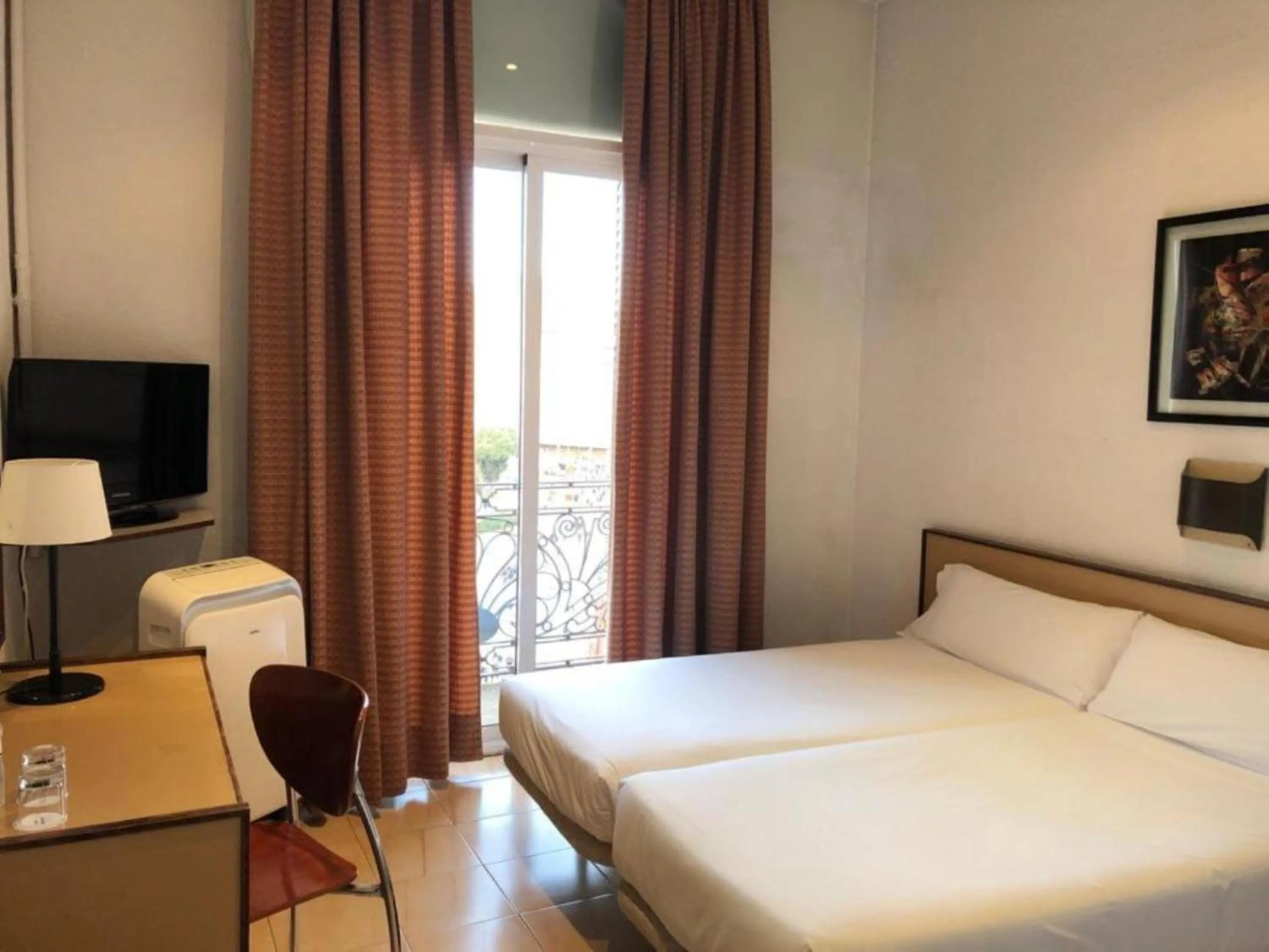 Bed in Hotel Monegal