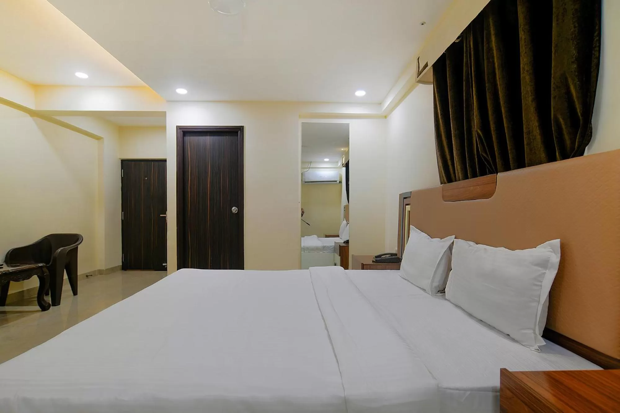 Bed in FabHotel Imperial Regency